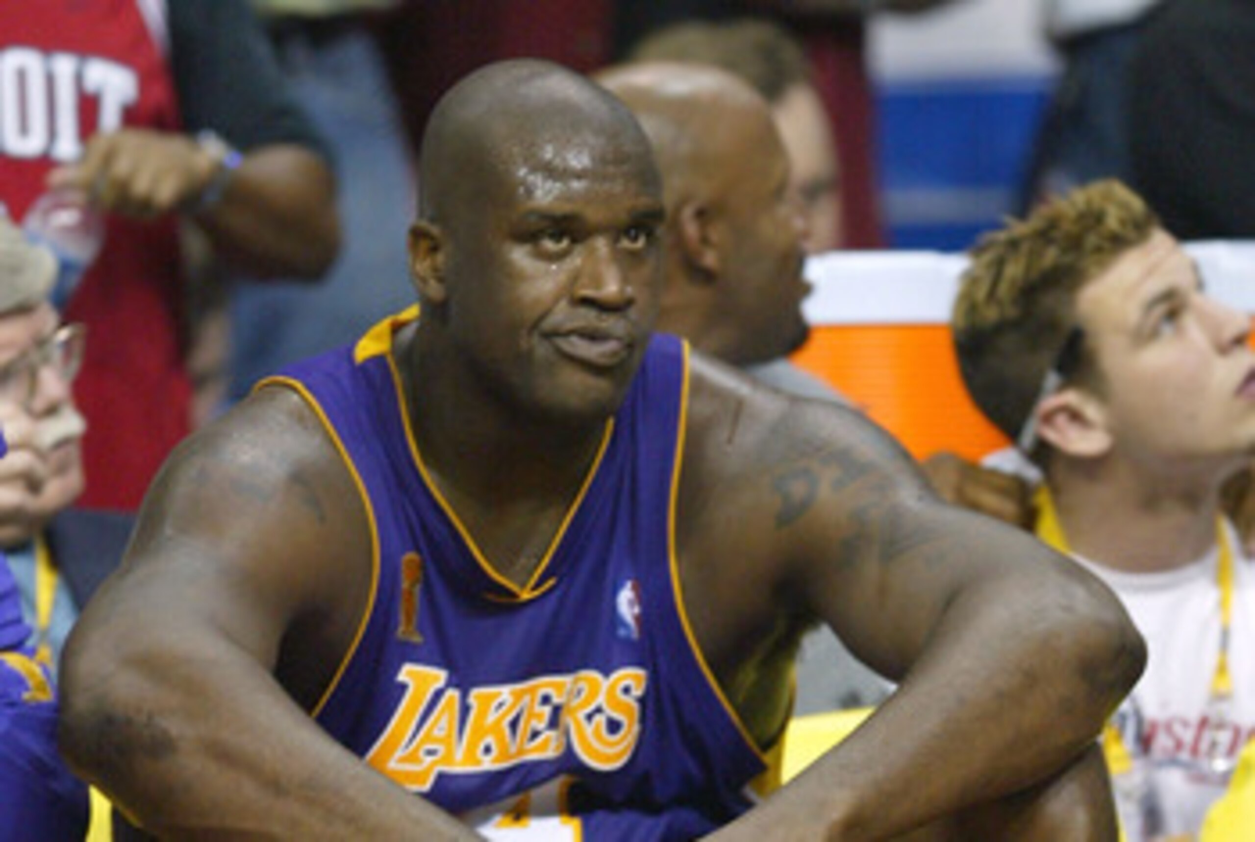 AUBURN HILLS, MI - JUNE 15: Shaquille O'Neal #34 of the Los Angeles Lakers looks on from the bench in the fourth quarter of game five of the 2004 NBA Finals against the Detroit Pistons on June 15, 2004 at The Palace of Auburn Hills in Auburn Hills, Michi AUBURN HILLS, MI - JUNE 15: Shaquille O'Neal #34 of the Los Angeles Lakers looks on from the bench in the fourth quarter of game five of the 2004 NBA Finals against the Detroit Pistons on June 15, 2004 at The Palace of Auburn Hills in Auburn Hills, Michi