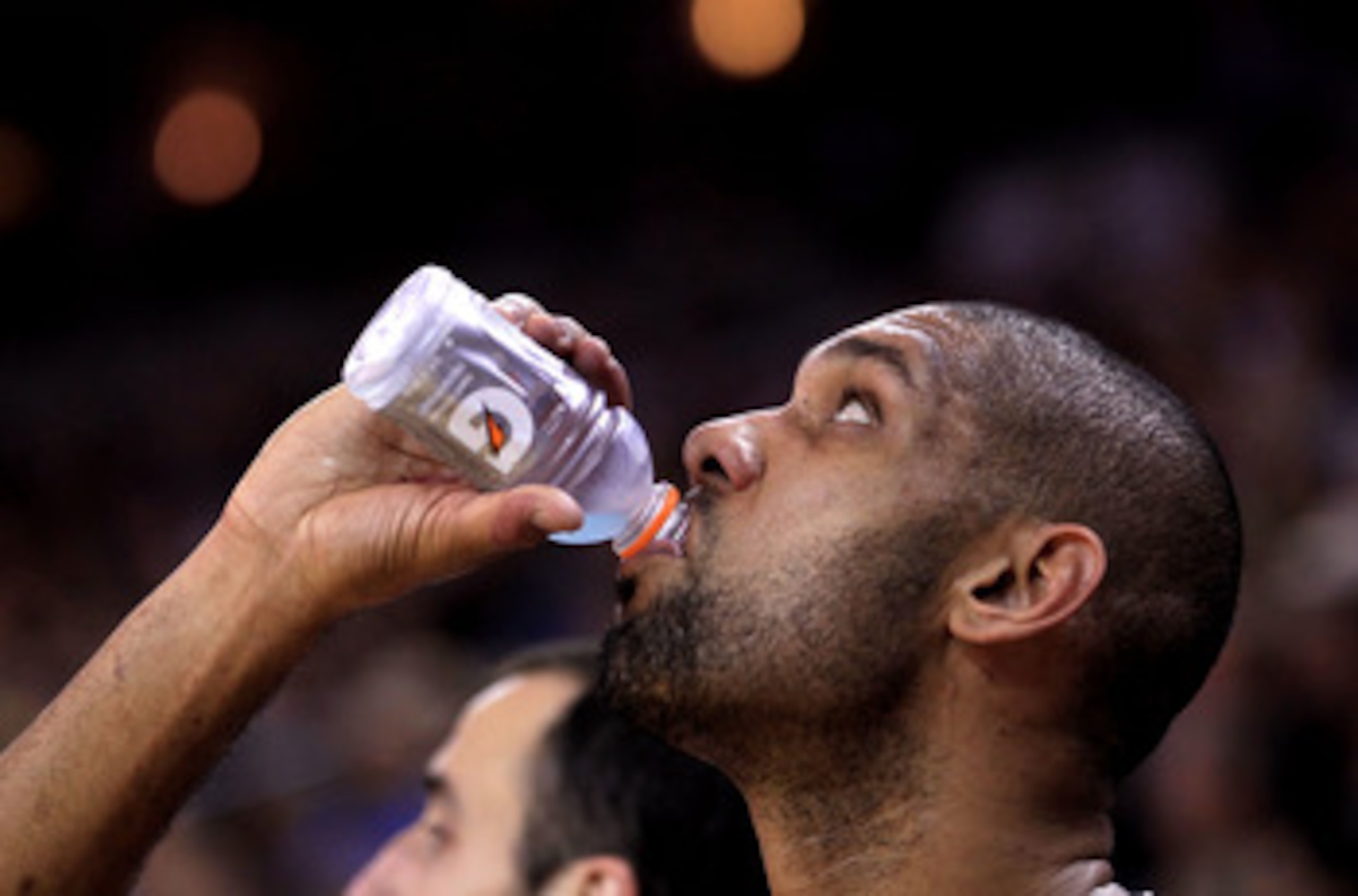 OAKLAND, CA - JANUARY 24: Tim Duncan #21 of the San Antonio Spurs drinks a Gatorade while sitting on the bench during their game against the Golden State Warriors at Oracle Arena on January 24, 2011 in Oakland, California. NOTE TO USER: User expressly a OAKLAND, CA - JANUARY 24: Tim Duncan #21 of the San Antonio Spurs drinks a Gatorade while sitting on the bench during their game against the Golden State Warriors at Oracle Arena on January 24, 2011 in Oakland, California. NOTE TO USER: User expressly a