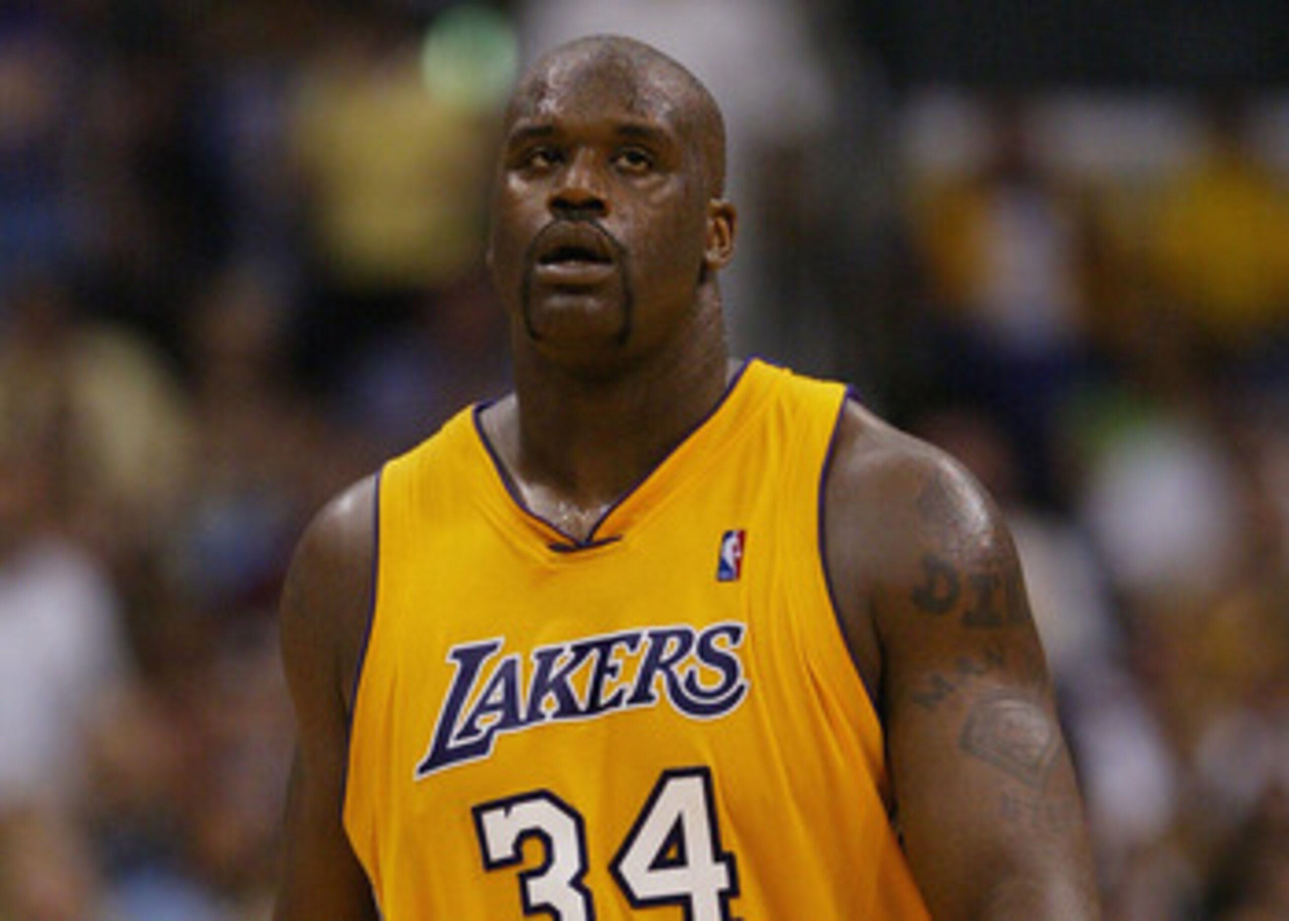 LOS ANGELES - MAY 31: Shaquille O'Neal #34 of the Los Angeles Lakers looks on against the Minnesota Timberwolves in Game six of the Western Conference Finals at Staples Center on May 31, 2004 in Los Angeles, California. The Lakers won 96-90. NOTE TO US LOS ANGELES - MAY 31: Shaquille O'Neal #34 of the Los Angeles Lakers looks on against the Minnesota Timberwolves in Game six of the Western Conference Finals at Staples Center on May 31, 2004 in Los Angeles, California. The Lakers won 96-90. NOTE TO US