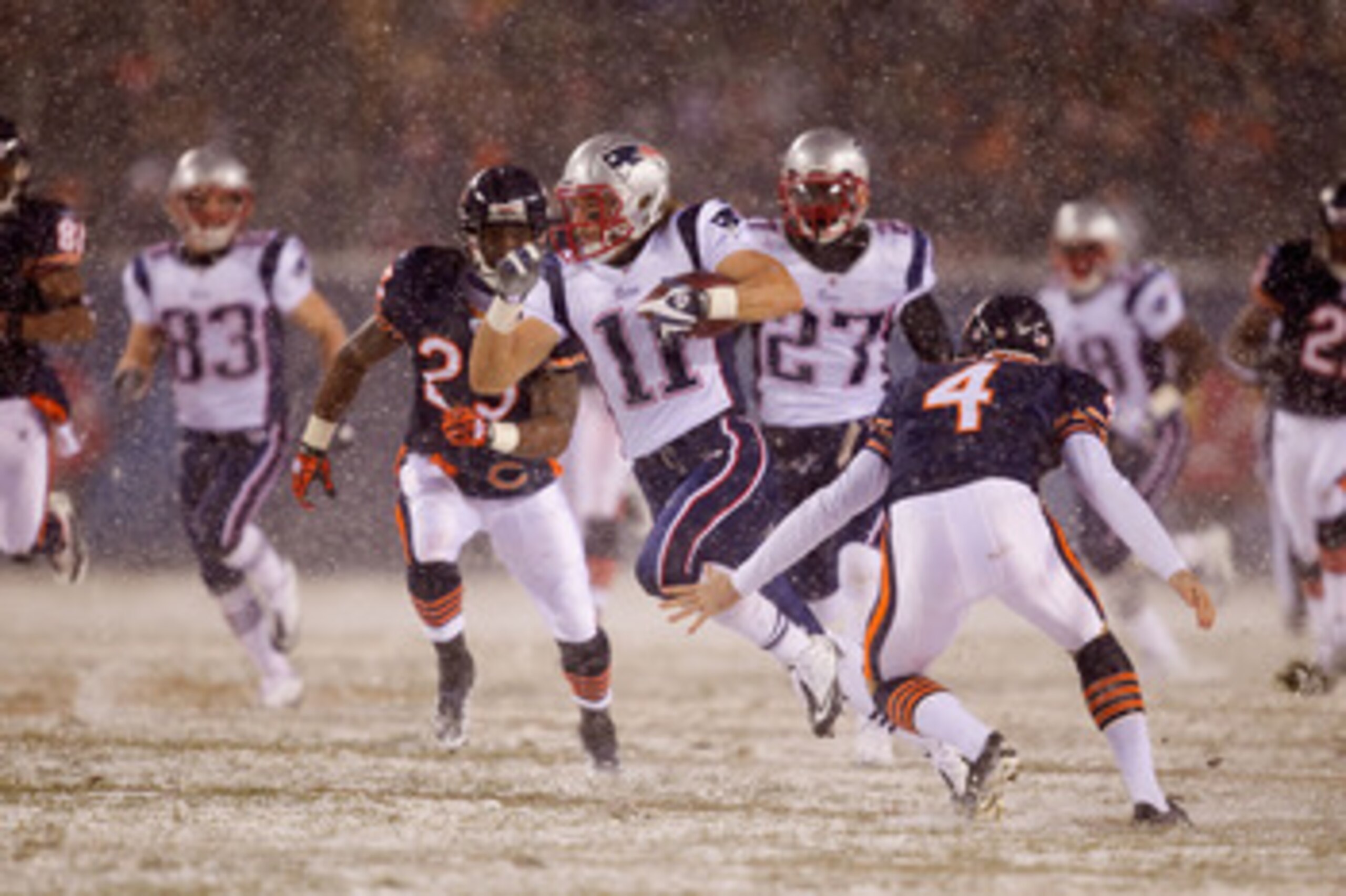 CHICAGO, IL - DECEMBER 12: Julian Edelman #11 of the New England Patriots returns a kick against the Chicago Bears at Soldier Field on December 12, 2010 in Chicago, Illinois.  The Patriots beat the Bears 36-7.  (Photo by Dilip Vishwanat/Getty Images)