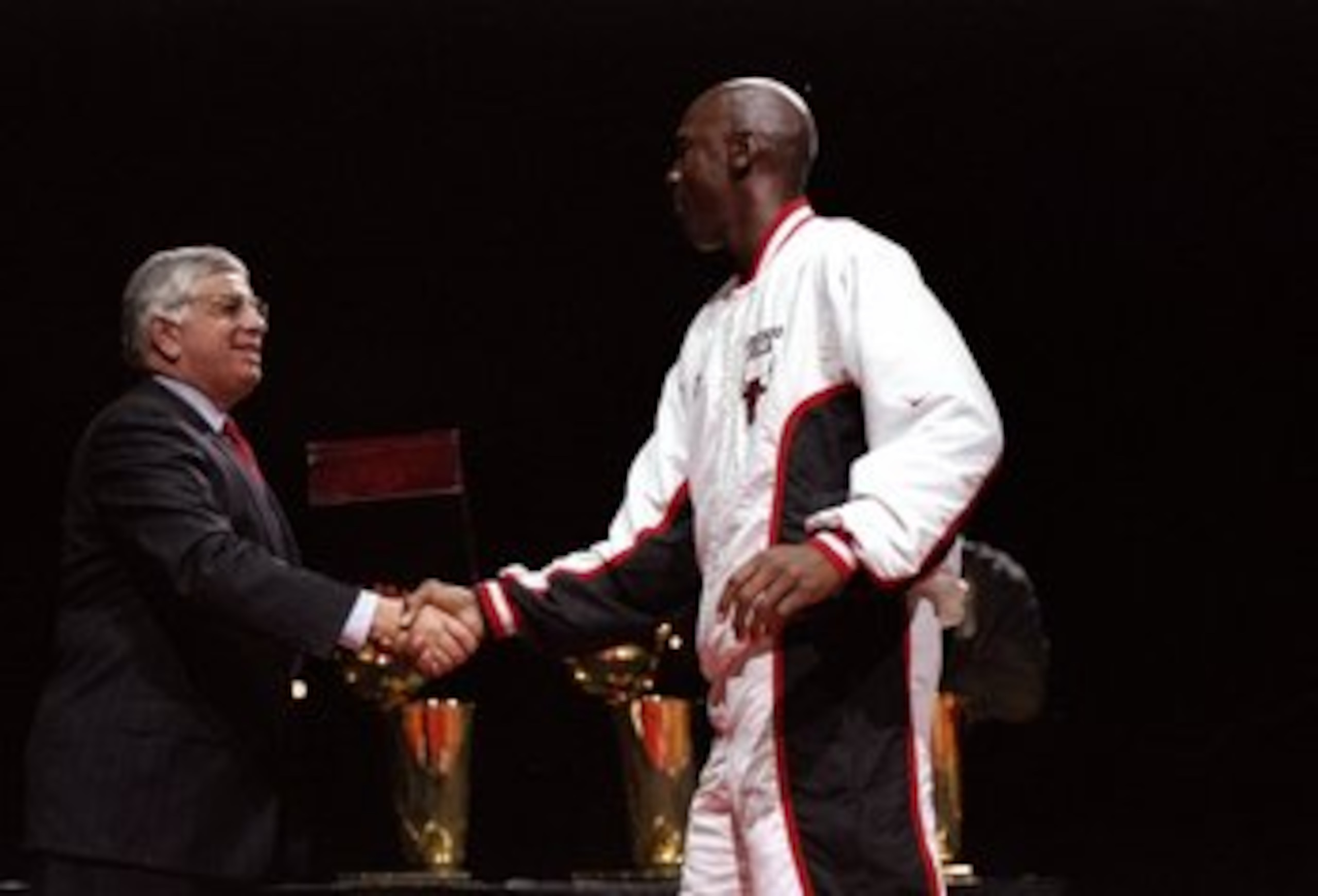 1 Nov 1997: Guard Michael Jordan of the Chicago Bulls shakes hands with David Stern during the presentation of championship rings prior to a game against the Philadelphia 76ers at the United Center in Chicago, Illinois. The Bulls won the game 94-74. Man 1 Nov 1997: Guard Michael Jordan of the Chicago Bulls shakes hands with David Stern during the presentation of championship rings prior to a game against the Philadelphia 76ers at the United Center in Chicago, Illinois. The Bulls won the game 94-74. Man