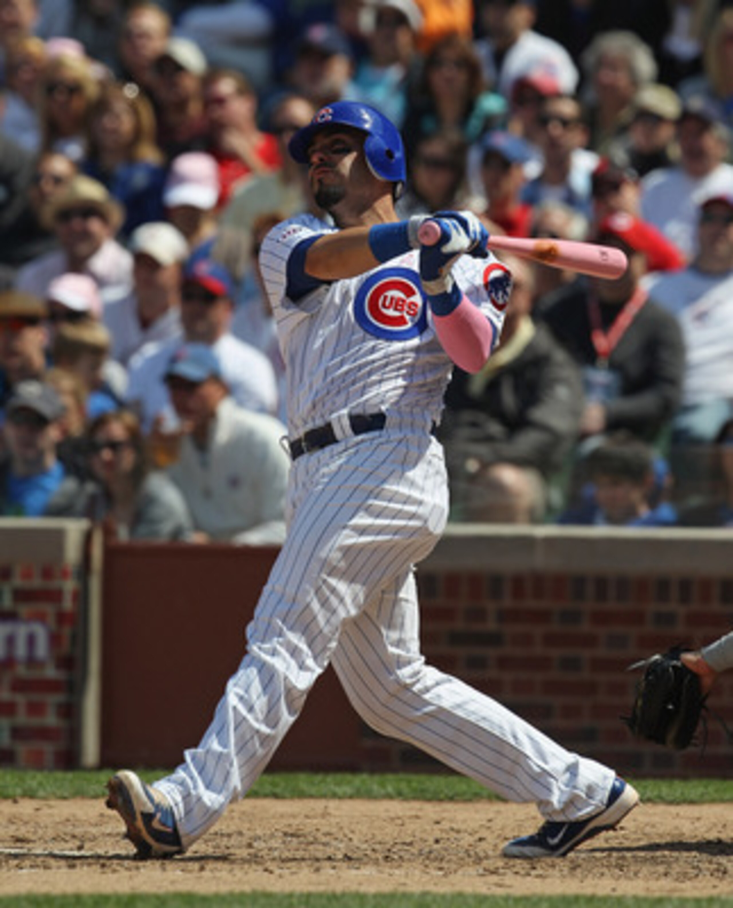 CHICAGO, IL - MAY 08: Geovany Soto #18 of the Chicago Cubs takes a swing against the Cincinnati Reds at Wrigley Field on May 8, 2011 in Chicago, Illinois. The Reds defeated the Cubs 2-0. (Photo by Jonathan Daniel/Getty Images)
