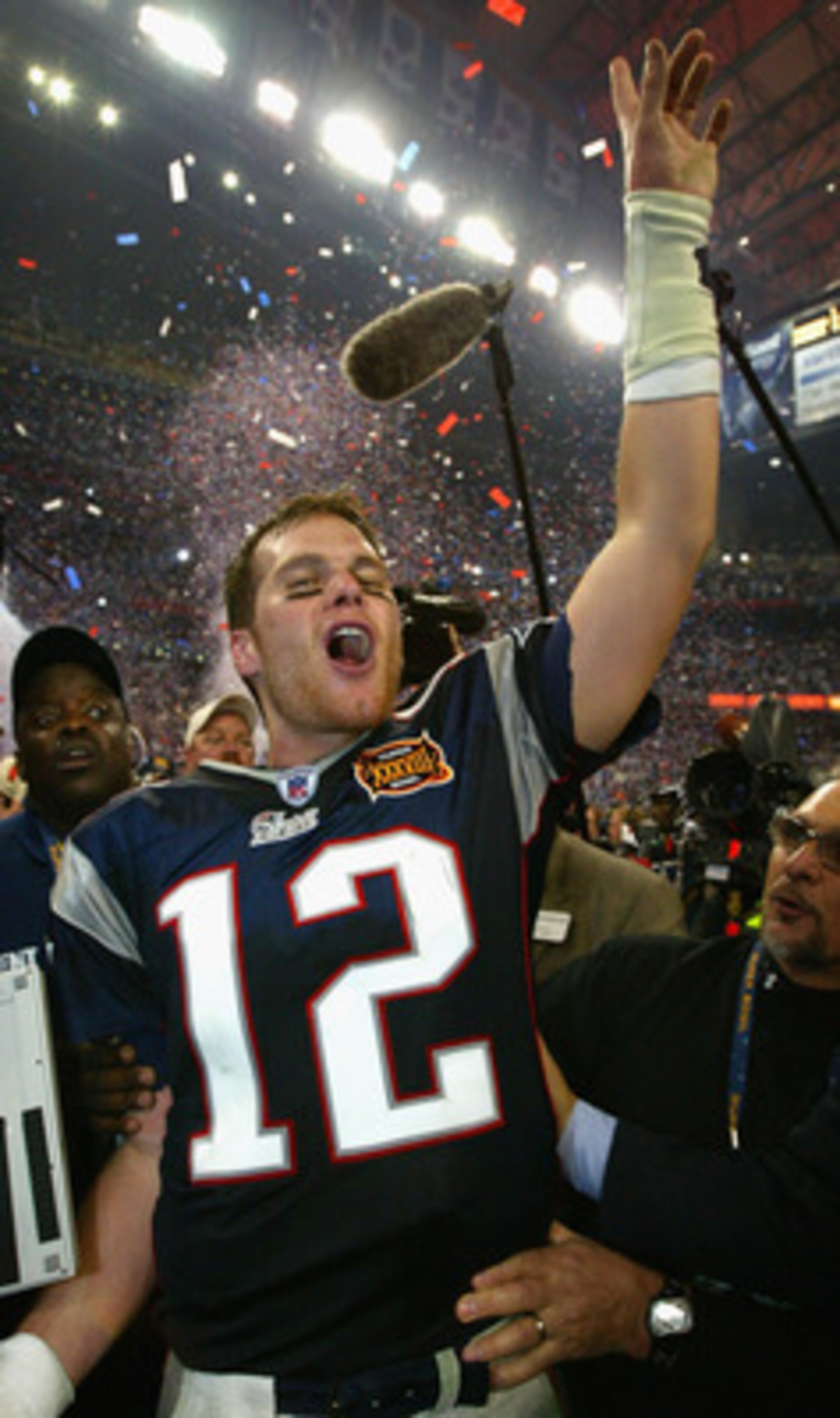 HOUSTON, TX - FEBRUARY 1:  MVP Tom Brady of the New England Patriots celebrates after defeating the Carolina Panthers 32-29 in Super Bowl XXXVIII at Reliant Stadium on February 1, 2004 in Houston, Texas. (Photo by Andy Lyons/Getty Images)
