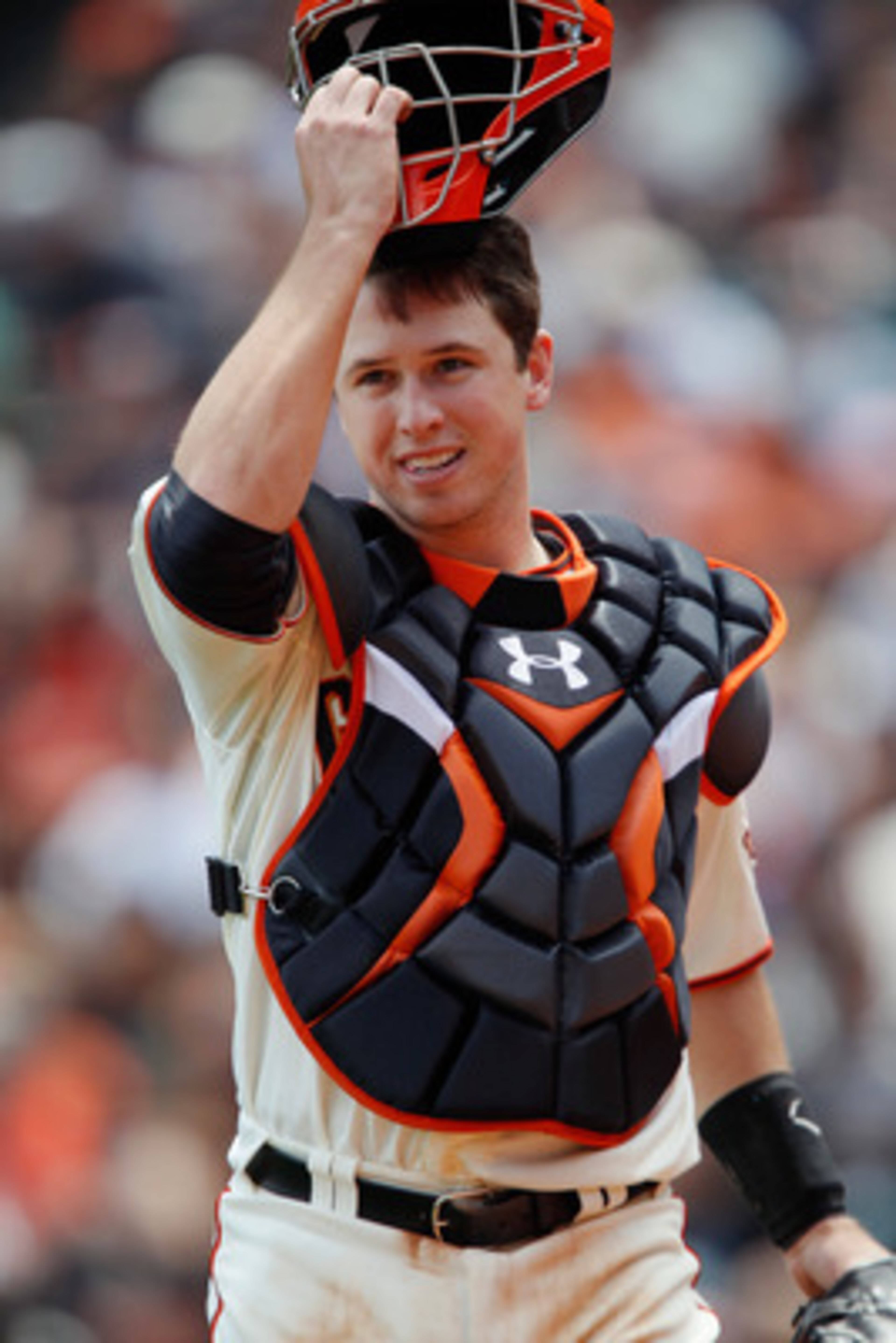 SAN FRANCISCO, CA - MAY 22:  Catcher Buster Posey #28 of the San Francisco Giants heads to the dugout after getting out of an inning against the Oakland A's at AT&T Park on May 22, 2011 in San Francisco, California.  The Giants won 5-4 in 11 innings.  (Ph