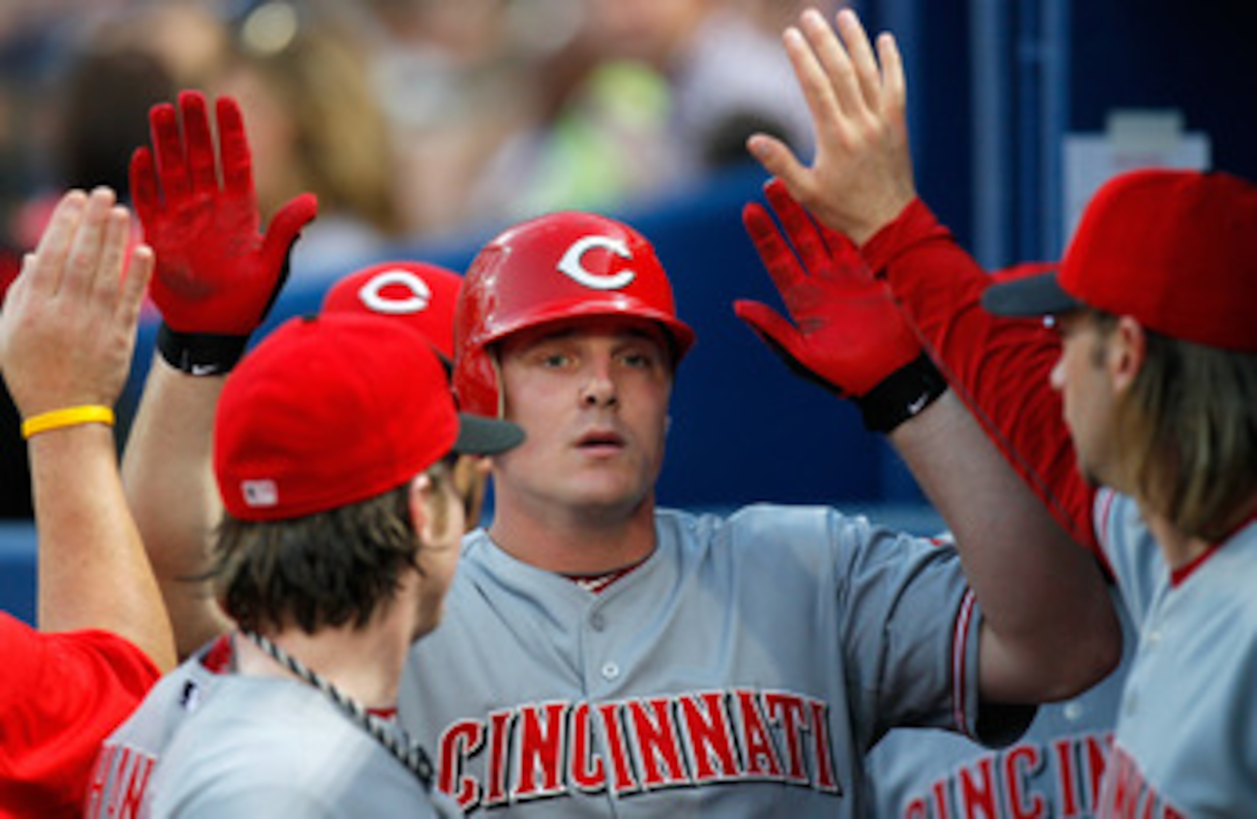 ATLANTA, GA - MAY 29:  Jay Bruce #32 of the Cincinnati Reds celebrates in the dugout after hitting a solo homer in the second inning against the Atlanta Braves at Turner Field on May 29, 2011 in Atlanta, Georgia.  (Photo by Kevin C. Cox/Getty Images)