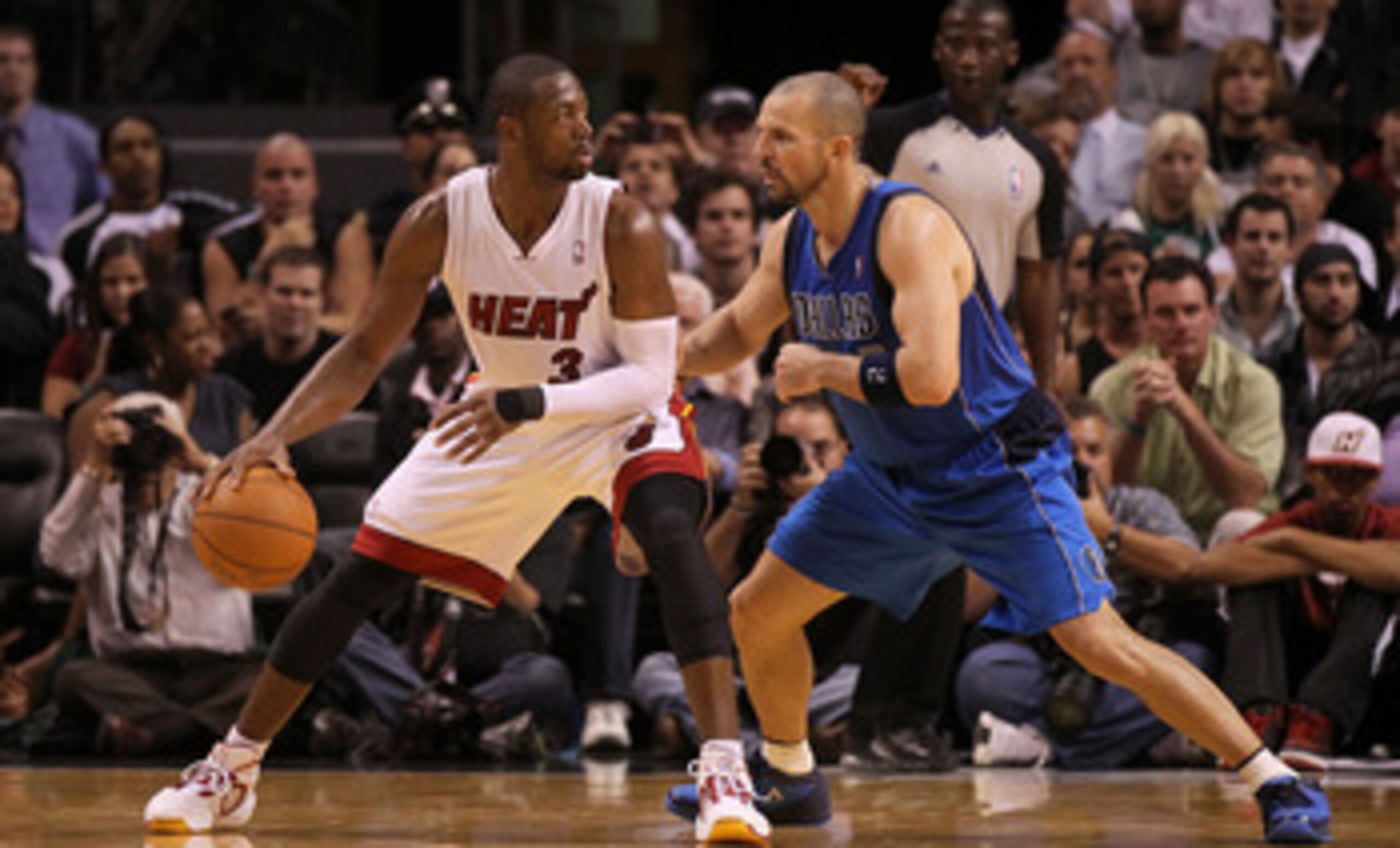 MIAMI, FL - DECEMBER 20:  Dwyane Wade #3 of the Miami Heat posts up Jason Kidd #2 of the Dallas Mavericks during a game at American Airlines Arena on December 20, 2010 in Miami, Florida. NOTE TO USER: User expressly acknowledges and agrees that, by downlo
