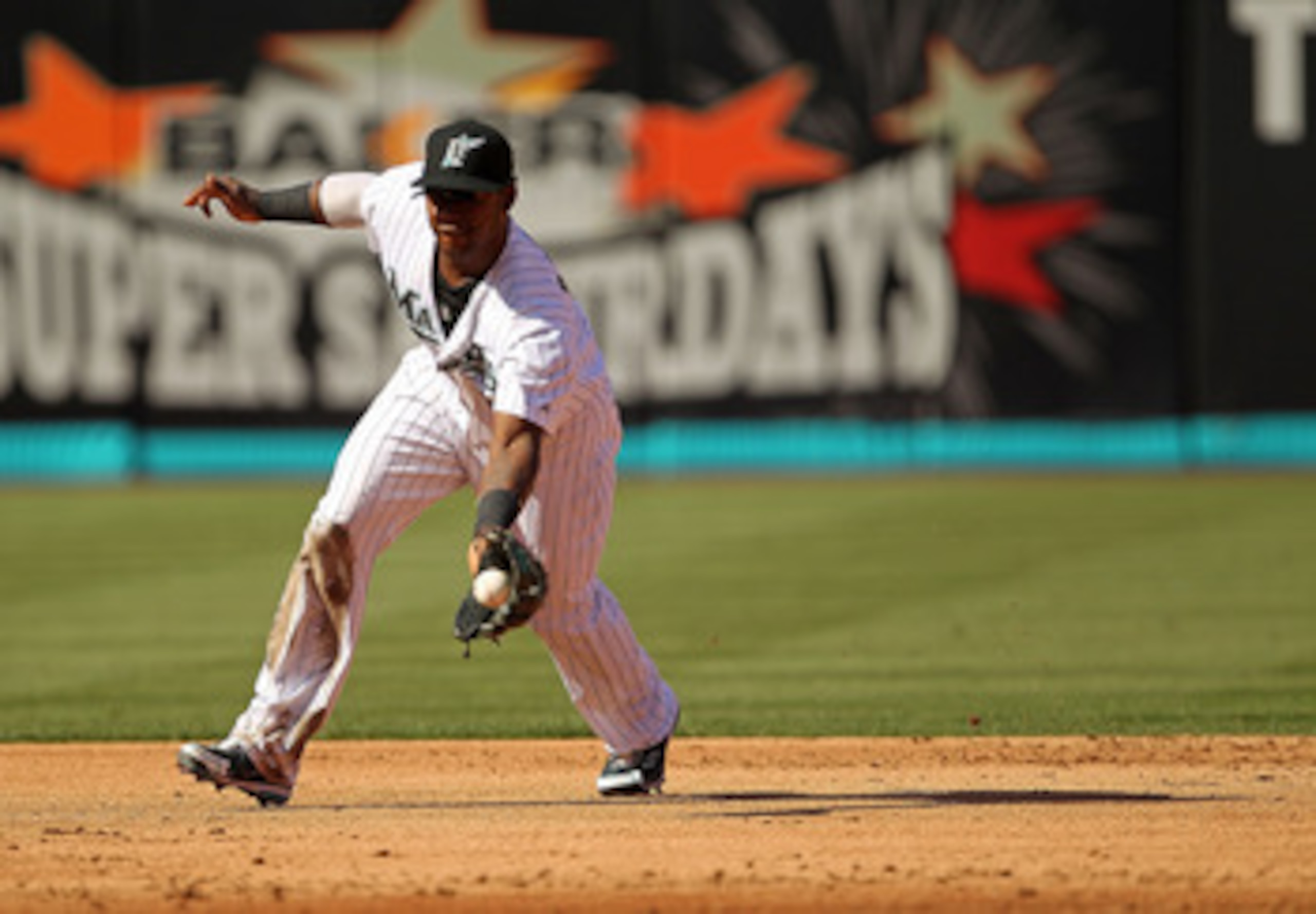 MIAMI GARDENS, FL - MAY 21: Hanley Ramirez #2 of the Florida Marlins fields a ground ball during a game against the Tampa Bay Rays at Sun Life Stadium on May 21, 2011 in Miami Gardens, Florida. (Photo by Mike Ehrmann/Getty Images)