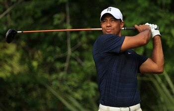 PONTE VEDRA BEACH, FL - MAY 12:  Tiger Woods hits a tee shot on the fifth hole during the first round of THE PLAYERS Championship held at THE PLAYERS Stadium course at TPC Sawgrass on May 12, 2011 in Ponte Vedra Beach, Florida.  (Photo by Streeter Lecka/G