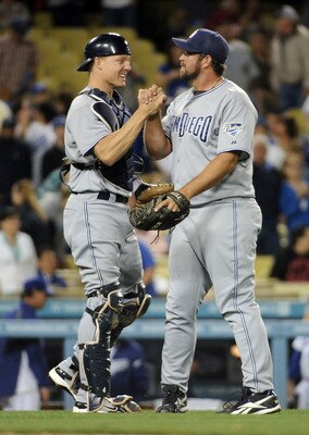 LOS ANGELES, CA - APRIL 30: Nick Hundley and Heath Bell #21 of the San Diego Padres celebrate a 5-2 win over the Los Angeles Dodgers after the ninth inning at Dodger Stadium on April 30, 2011 in Los Angeles, California. (Photo by Harry How/Getty Images) LOS ANGELES, CA - APRIL 30: Nick Hundley and Heath Bell #21 of the San Diego Padres celebrate a 5-2 win over the Los Angeles Dodgers after the ninth inning at Dodger Stadium on April 30, 2011 in Los Angeles, California. (Photo by Harry How/Getty Images)