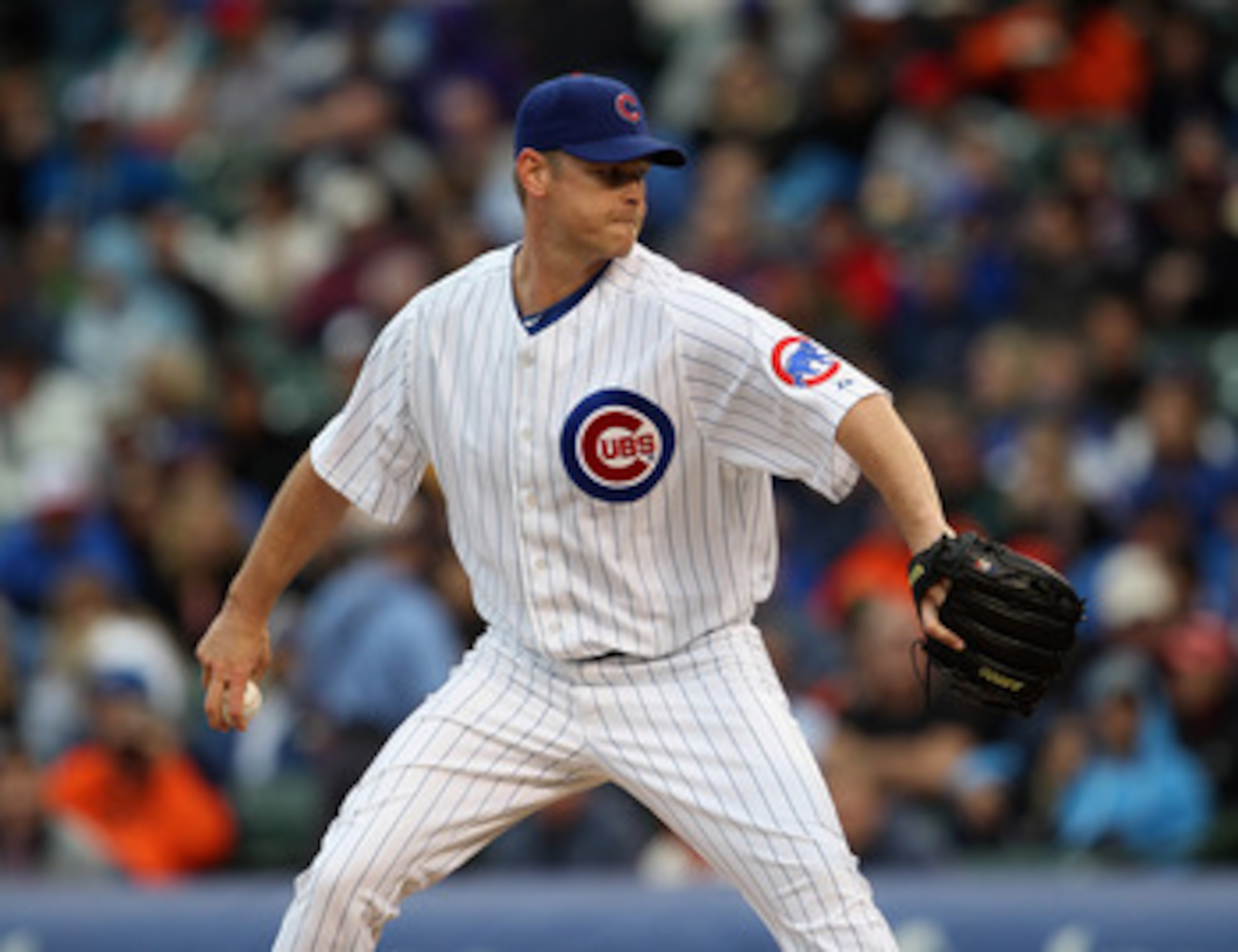 CHICAGO, IL - MAY 13:  Kerry Wood #34 of the Chicago Cubs pitches against the San Francisco Giants at Wrigley Field on May 13, 2011 in Chicago, Illinois. The Cubs defeated the Giants 11-4.  (Photo by Jonathan Daniel/Getty Images)