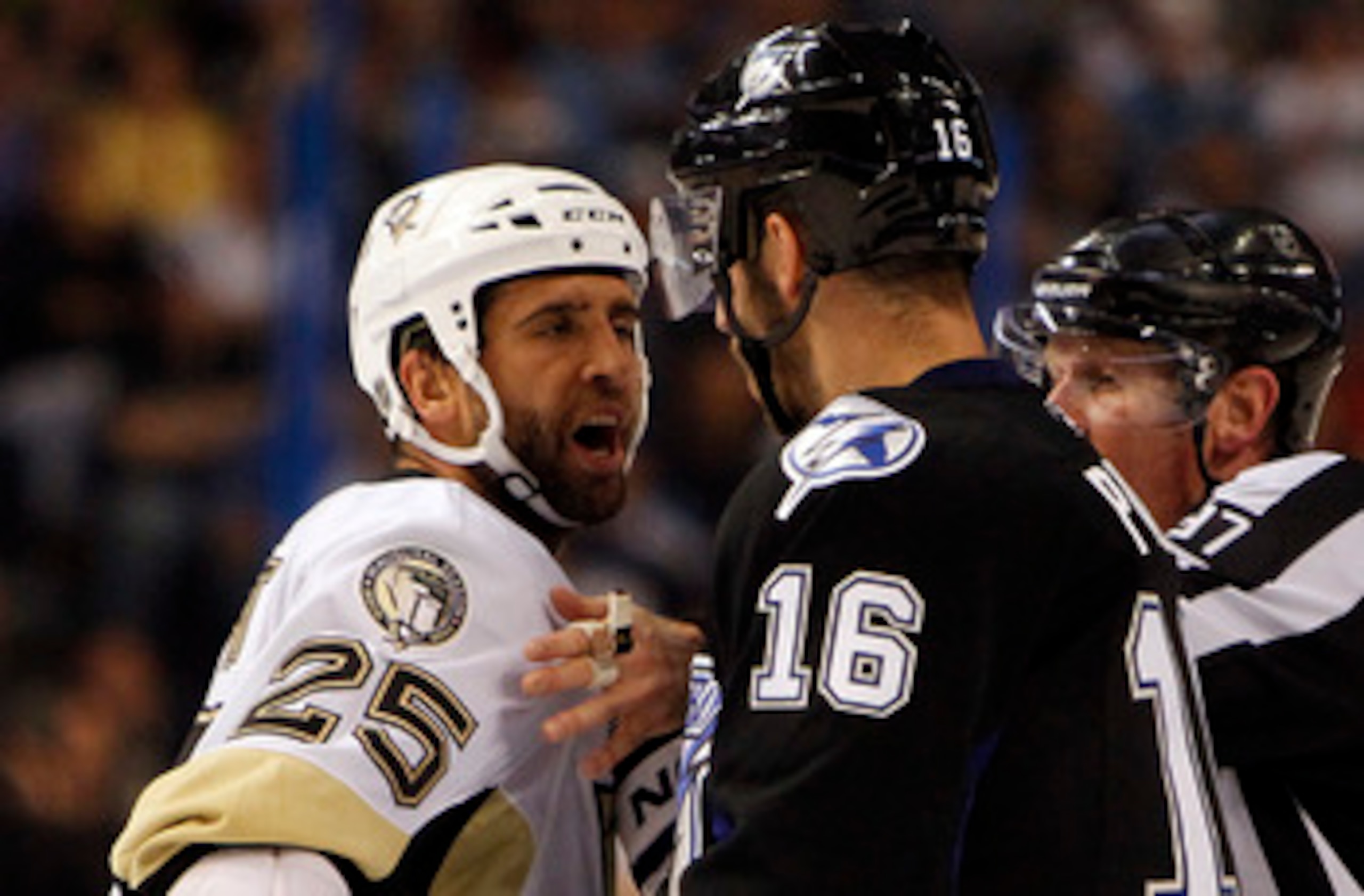 TAMPA, FL - APRIL 25: Maxime Talbot #25 of the Pittsburgh Penguins has a disagreement with Teddy Purcell #16 of the Tampa Bay Lightning in Game Six of the Eastern Conference Quarterfinals during the 2011 NHL Stanley Cup Playoffs at the St. Pete Times Foru