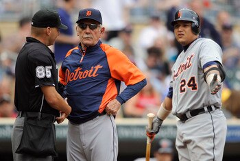 MINNEAPOLIS, MN - MAY 11: Manager Jim Leyland #10 of the Detroit Tigers gets between umpire Vic Carapazza #85 and Miguel Cabrera #24 of the Detroit Tigers after Cabrera was ejected by Carapazza during in the sixth inning of their game against the Minnesot MINNEAPOLIS, MN - MAY 11: Manager Jim Leyland #10 of the Detroit Tigers gets between umpire Vic Carapazza #85 and Miguel Cabrera #24 of the Detroit Tigers after Cabrera was ejected by Carapazza during in the sixth inning of their game against the Minnesot