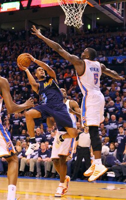 OKLAHOMA CITY, OK - APRIL 27: Arron Afflalo #6 of the Denver Nuggets shoots the ball against Kendrick Perkins #5 of the Oklahoma City Thunder in Game Five of the Western Conference Quarterfinals in the 2011 NBA Playoffs on April 27, 2011 at the Ford Cente