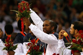 BEIJING - AUGUST 24:  Michael Redd #8 of the United States smiles on the podium after winning the gold medal over Spain in the men's basketball final during Day 16 of the Beijing 2008 Olympic Games at the Beijing Olympic Basketball Gymnasium on August 24,