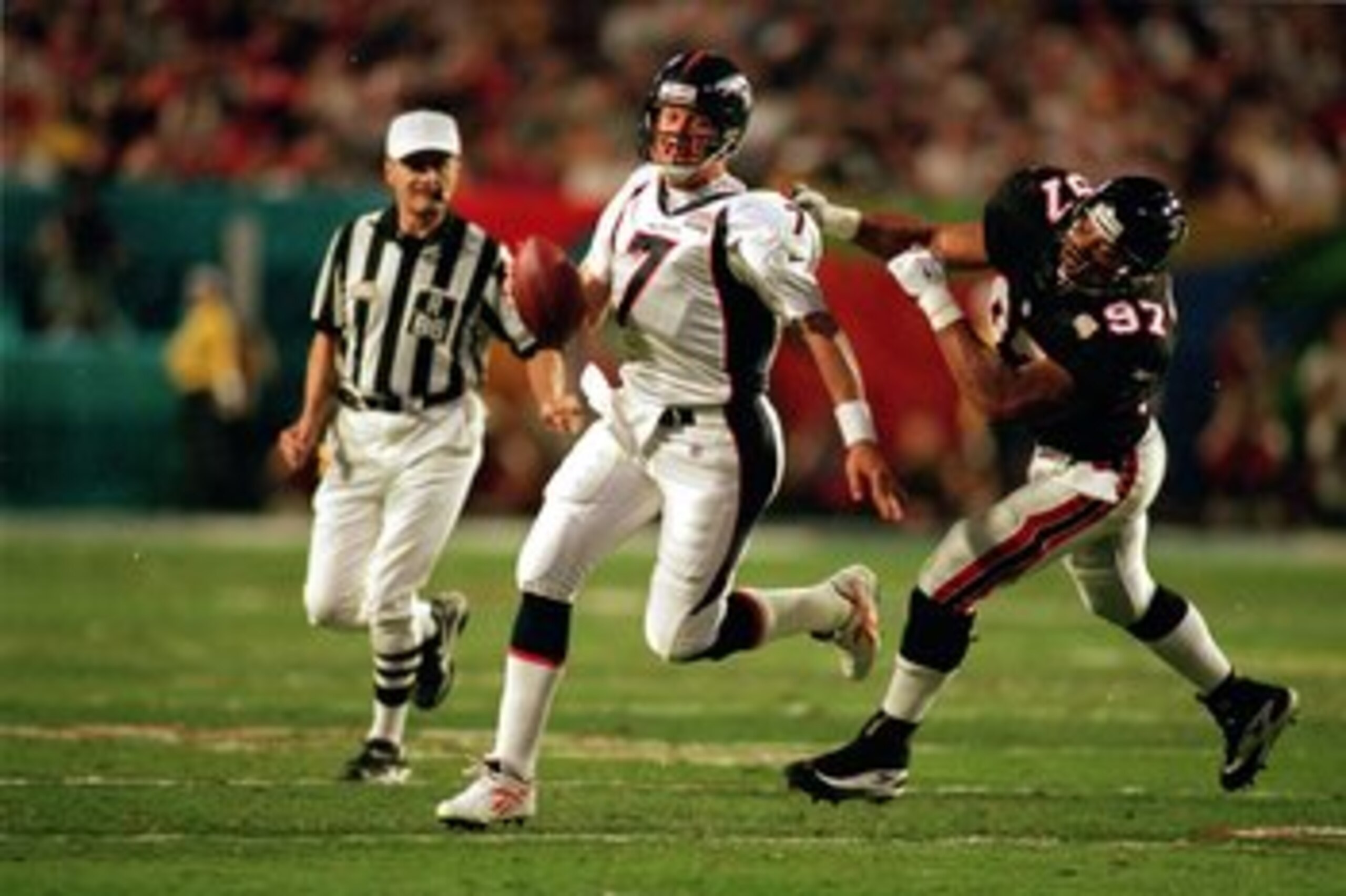 31 Jan 1999:   John Elway #7 of the Denver Broncos is sacked by Cornelius Bennett #97 of the Atlanta Falcons during the Superbowl XXXIII at the Pro Player Stadium in Miami, Florida. The Broncos defeated the Falcons  34-19. Mandatory Credit: Al Bello  /All