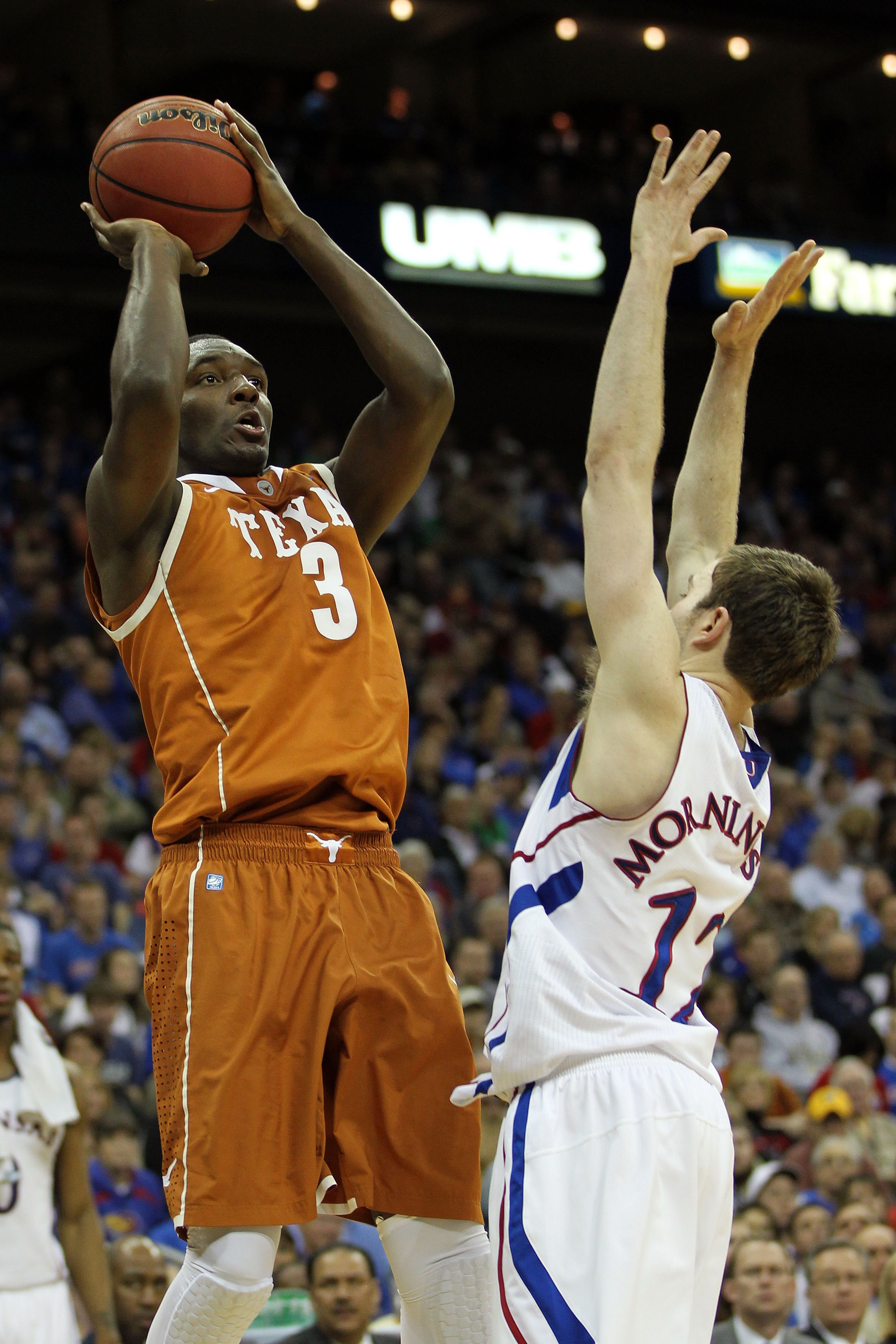 KANSAS CITY, MO - MARCH 12:  Jordan Hamilton #3 of the Texas Longhorns goes up for a shot against Brady Morningstar #12 of the Kansas Jayhawks during the 2011 Phillips 66 Big 12 Men's Basketball Tournament championship game at Sprint Center on March 12, 2