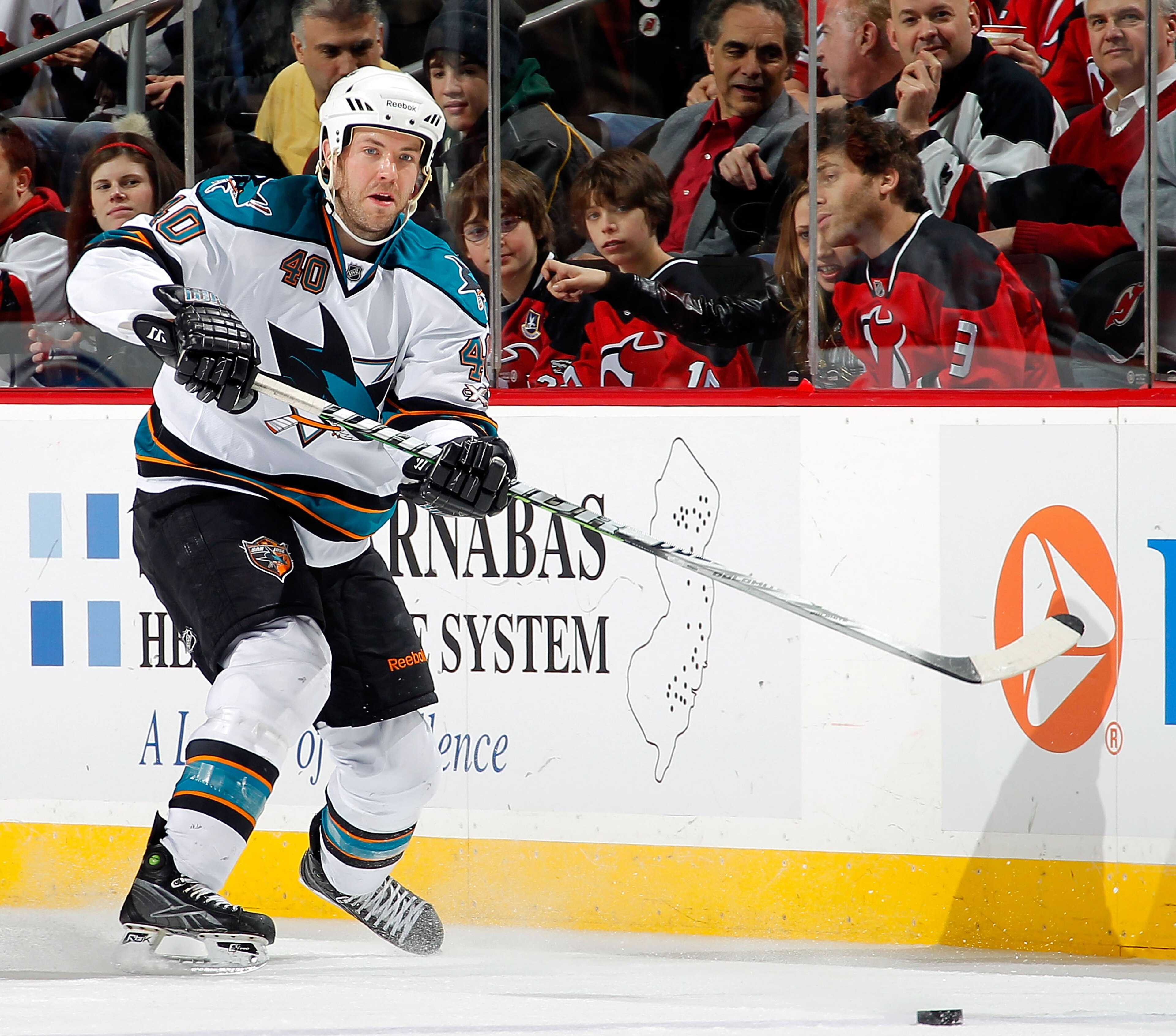 NEWARK, NJ - FEBRUARY 11: Kent Huskins #40 of the San Jose Sharks skates during an NHL hockey game against the New Jersey Devils on February 11, 2011 at the Prudential Center in Newark, New Jersey. (Photo by Paul Bereswill/Getty Images) NEWARK, NJ - FEBRUARY 11: Kent Huskins #40 of the San Jose Sharks skates during an NHL hockey game against the New Jersey Devils on February 11, 2011 at the Prudential Center in Newark, New Jersey. (Photo by Paul Bereswill/Getty Images)