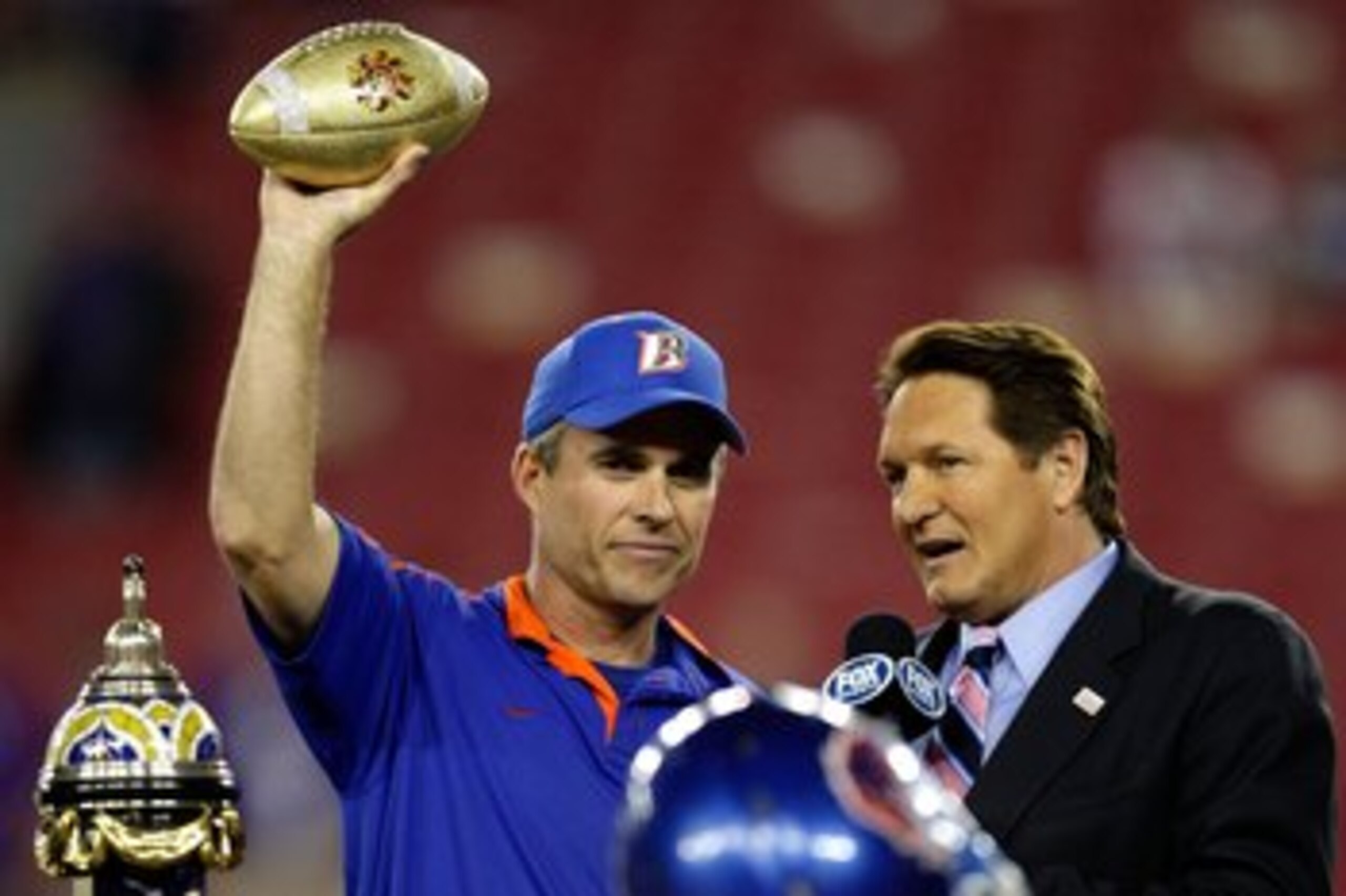 GLENDALE, AZ - JANUARY 04:  Head coach Chris Petersen of the Boise State Broncos celebrates after defeating the TCU Horned Frogs 17-10 during the Tostitos Fiesta Bowl at the Universtity of Phoenix Stadium on January 4, 2010 in Glendale, Arizona.  (Photo b