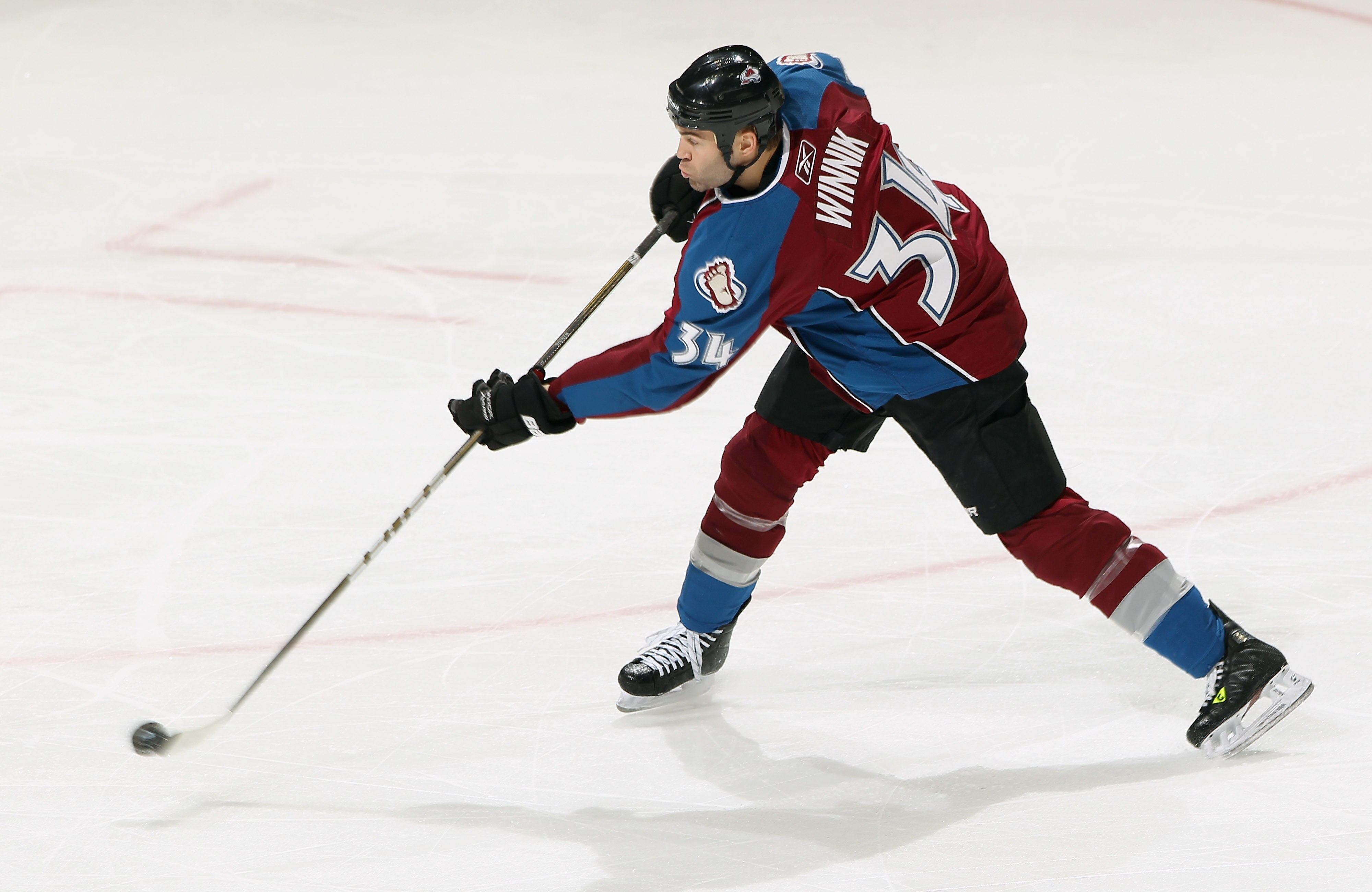 DENVER, CO - MARCH 31:  Daniel Winnik #34 of the Colorado Avalanche shoots the puck against the Nashville Predators at the Pepsi Center on March 31, 2011 in Denver, Colorado. The Nashville Predators defeated the Colorado Avalanche 3-2.  (Photo by Doug Pen