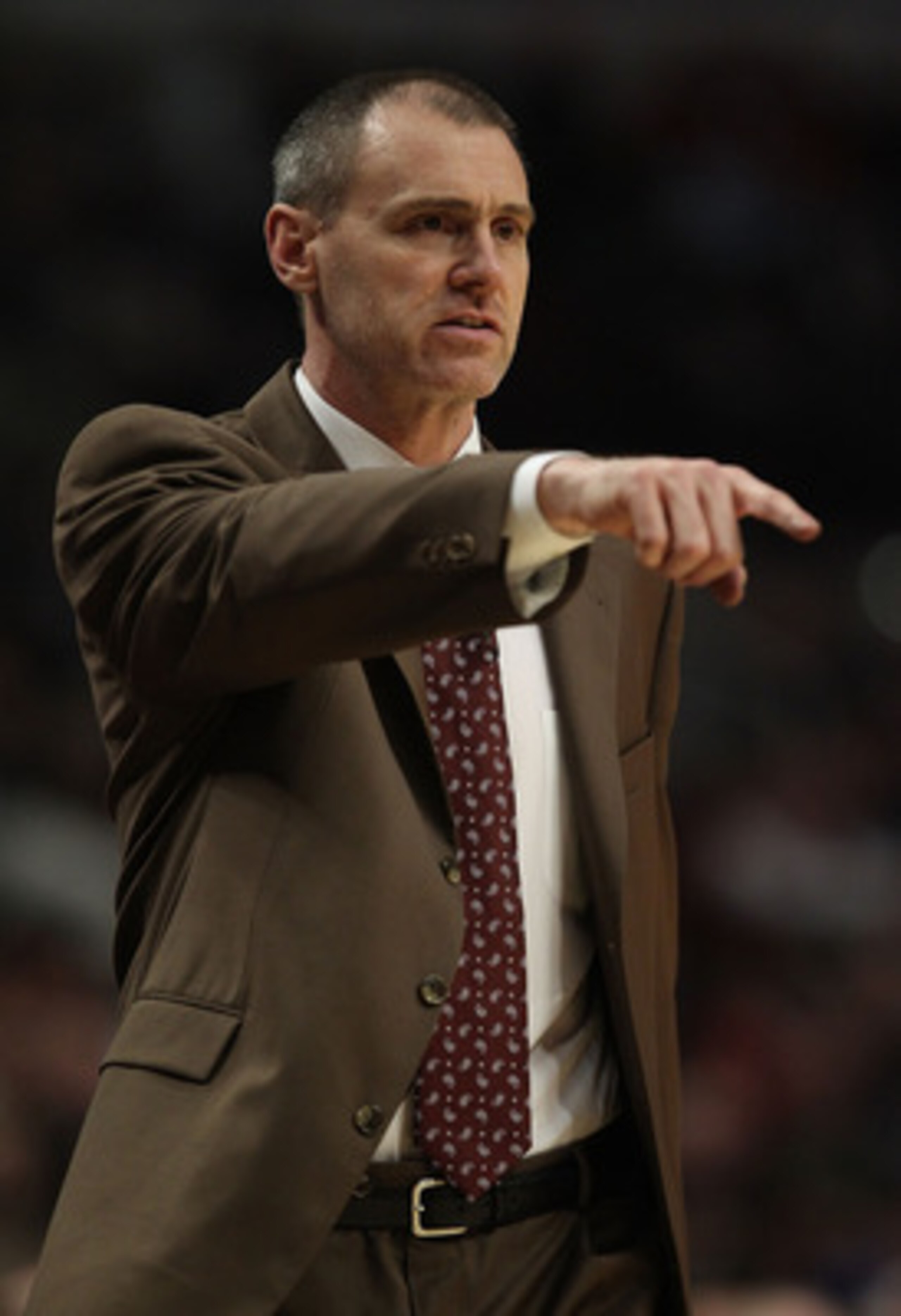 CHICAGO, IL - JANUARY 20: Head coach Rick Carlisle of the Dallas Mavericks gives instructions to his team against the Chicago Bulls at the United Center on January 20, 2011 in Chicago, Illinois. The Bulls defeated the Mavericks 82-77. NOTE TO USER: User e