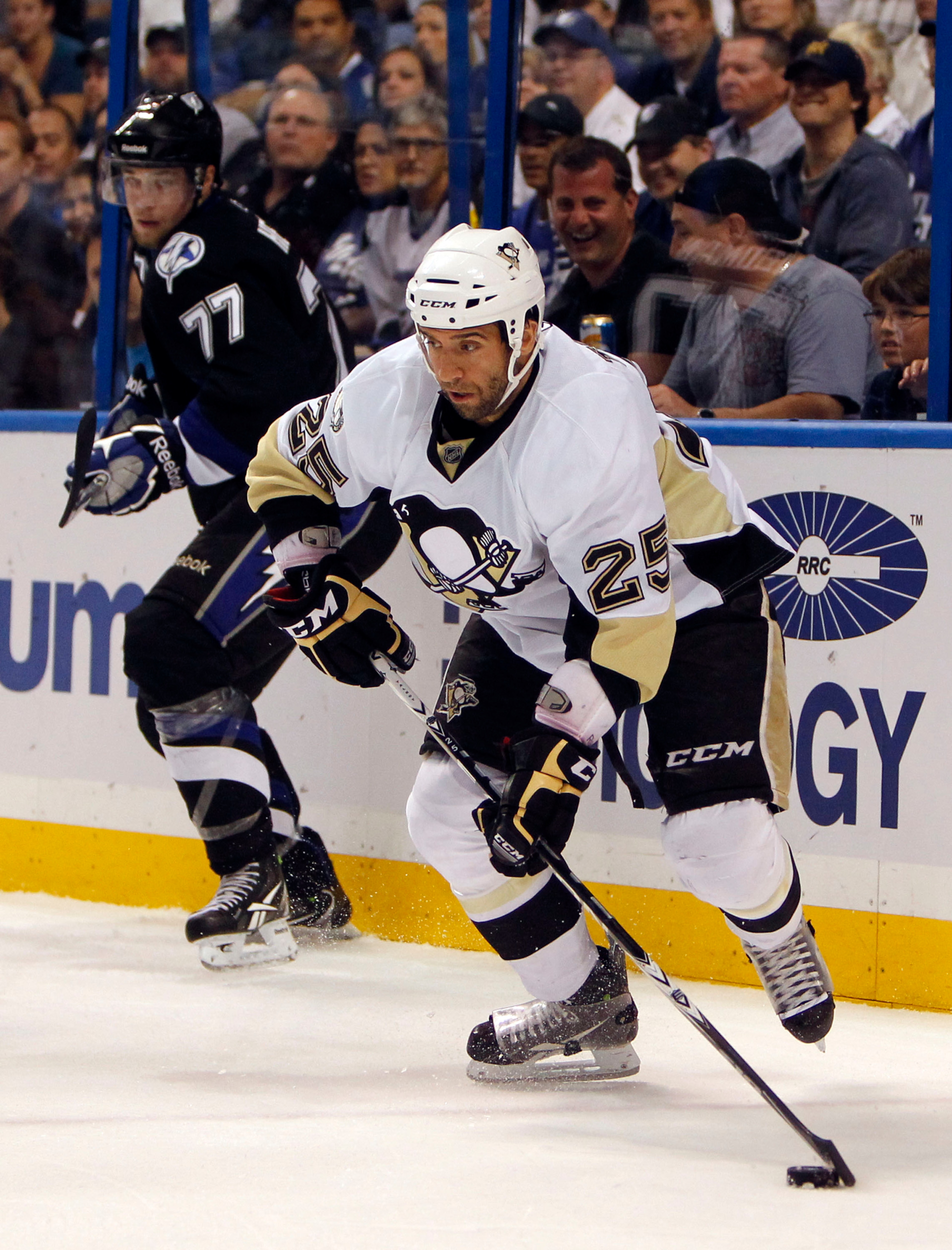 TAMPA, FL - APRIL 20: Maxime Talbot #25 of the Pittsburgh Penguins skates with the puck against the Tampa Bay Lightning in Game Four of the Eastern Conference Quarterfinals during the 2011 NHL Stanley Cup Playoffs at the St. Pete Times Forum on April 20, TAMPA, FL - APRIL 20: Maxime Talbot #25 of the Pittsburgh Penguins skates with the puck against the Tampa Bay Lightning in Game Four of the Eastern Conference Quarterfinals during the 2011 NHL Stanley Cup Playoffs at the St. Pete Times Forum on April 20,