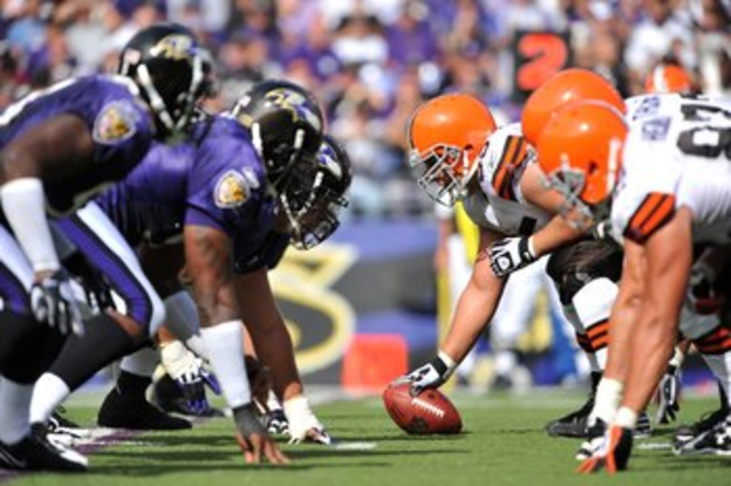 BALTIMORE - SEPTEMBER 27:  Alex Mack #55 of the Cleveland Browns snaps the ball against the Baltimore Ravens at M&T Bank Stadium on September 27, 2009 in Baltimore, Maryland. The Ravens defeated the Browns 34-3. (Photo by Larry French/Getty Images)
