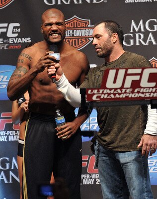 LAS VEGAS - MAY 28:  UFC fighter Quinton 'Rampage' Jackson (L) speaks to Joe Rogan (R) and the crowd about his fight against UFC fighter Rashad Evans at UFC 114: Rampage versus Rashad at the Mandalay Bay Hotel on May 28, 2010 in Las Vegas, Nevada.  (Photo