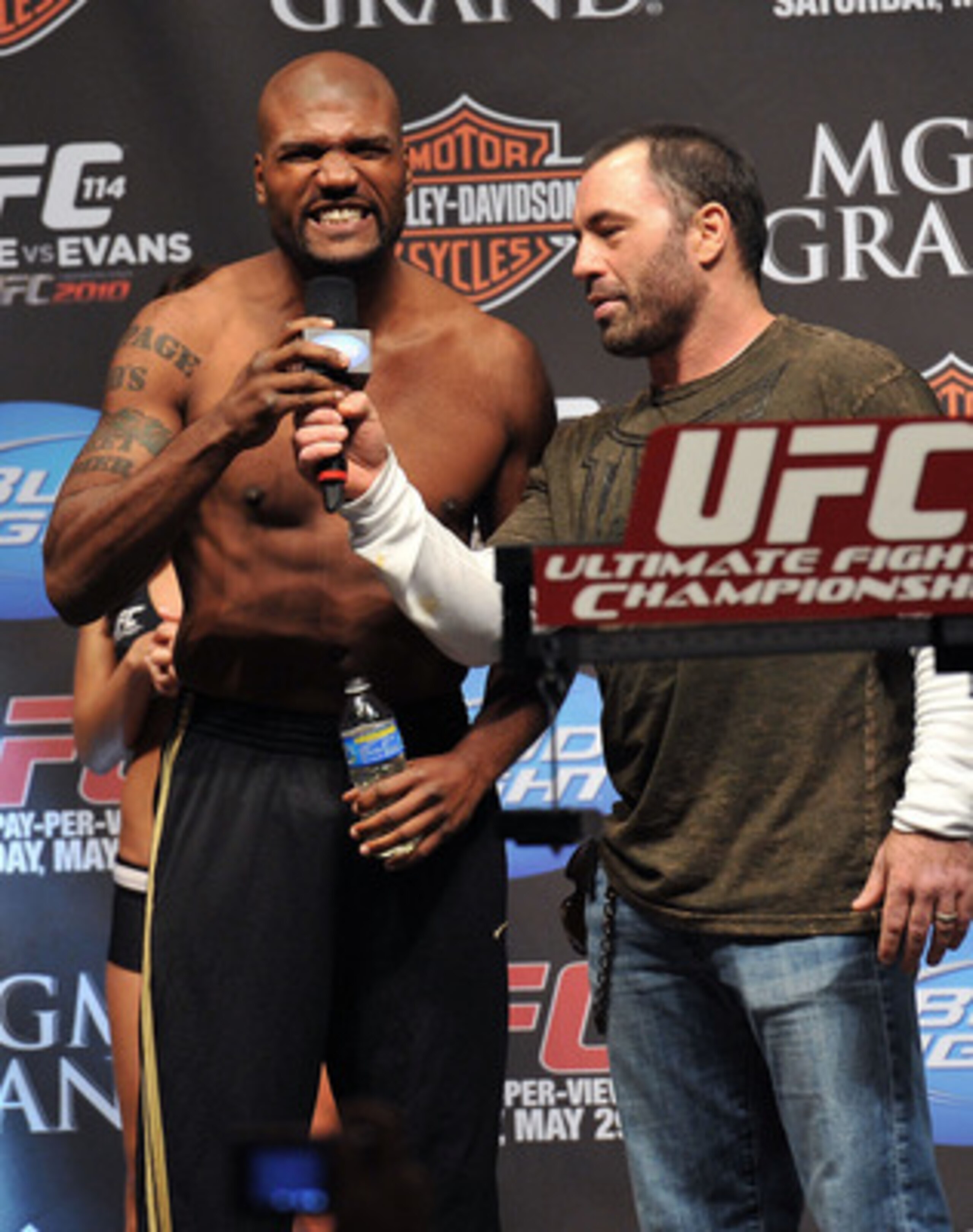 LAS VEGAS - MAY 28: UFC fighter Quinton 'Rampage' Jackson (L) speaks to Joe Rogan (R) and the crowd about his fight against UFC fighter Rashad Evans at UFC 114: Rampage versus Rashad at the Mandalay Bay Hotel on May 28, 2010 in Las Vegas, Nevada. (Photo LAS VEGAS - MAY 28: UFC fighter Quinton 'Rampage' Jackson (L) speaks to Joe Rogan (R) and the crowd about his fight against UFC fighter Rashad Evans at UFC 114: Rampage versus Rashad at the Mandalay Bay Hotel on May 28, 2010 in Las Vegas, Nevada. (Photo