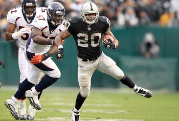 OAKLAND, CA - DECEMBER 19:  Darren McFadden #20 of the Oakland Raiders runs with the ball during their game against the Denver Broncos at Oakland-Alameda County Coliseum on December 19, 2010 in Oakland, California.  (Photo by Ezra Shaw/Getty Images)