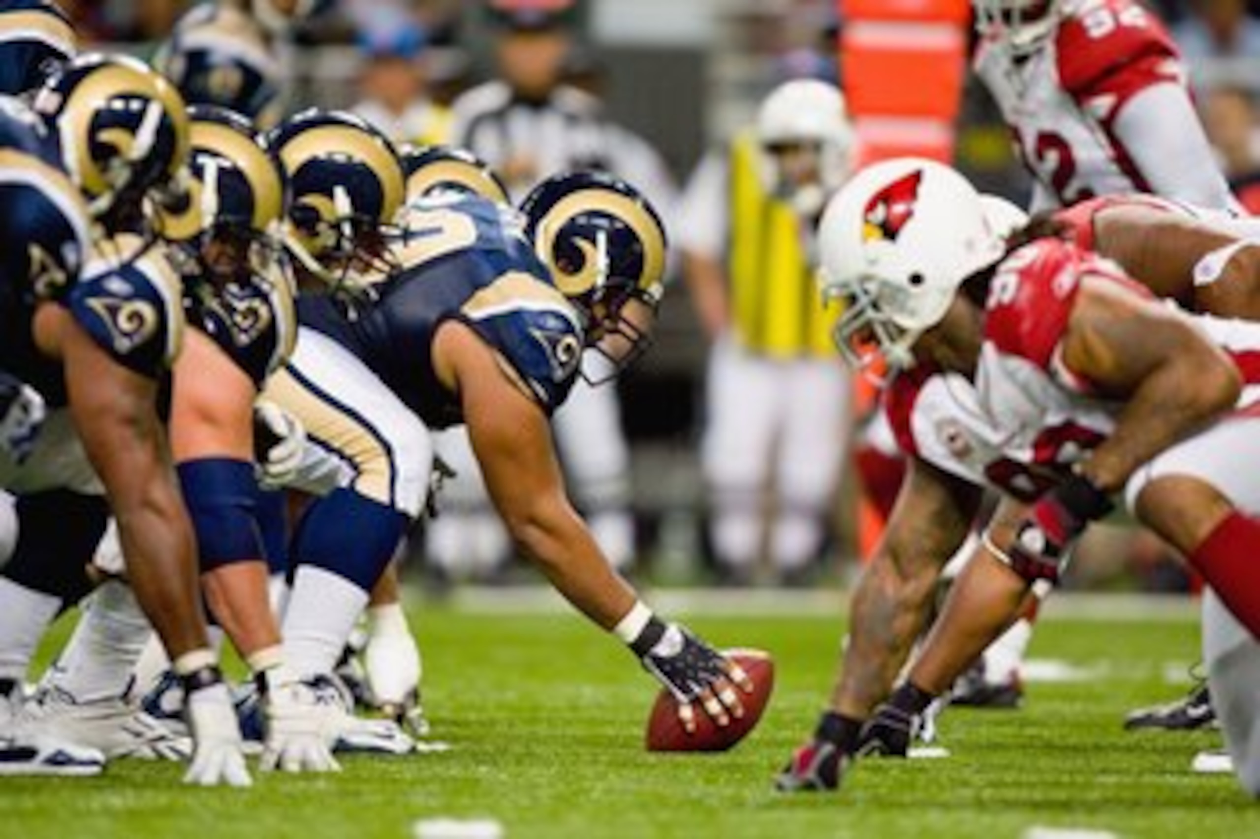 ST. LOUIS - NOVEMBER 22:  Jason Brown #60 of the St. Louis Rams gets ready to hike the ball against the Arizona Cardinals at the Edward Jones Dome on November 22, 2009 in St. Louis, Missouri. The Cardinals beat the Rams 21-13. (Photo by Dilip Vishwanat/Ge