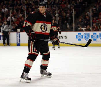 CHICAGO, IL - DECEMBER 08: Rob Klinkhammer #59 of the Chicago Blackhawks looks for a pass against of the Dallas Stars at the United Center on December 8, 2010 in Chicago, Illinois. The Blackhawks defeated the Stars 5-3. (Photo by Jonathan Daniel/Getty Ima