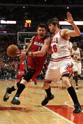 CHICAGO, IL - MAY 26:  Mike Miller #13 of the Miami Heat drives against Kyle Korver #26 of the Chicago Bulls in Game Five of the Eastern Conference Finals during the 2011 NBA Playoffs on May 26, 2011 at the United Center in Chicago, Illinois. NOTE TO USER