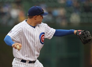 CHICAGO, IL - MAY 13: Jeff Baker #28 of the Chicago Cubs throws to 1st base against the San Francisco Giants at Wrigley Field on May 13, 2011 in Chicago, Illinois. The Cubs defeated the Giants 11-4. (Photo by Jonathan Daniel/Getty Images)