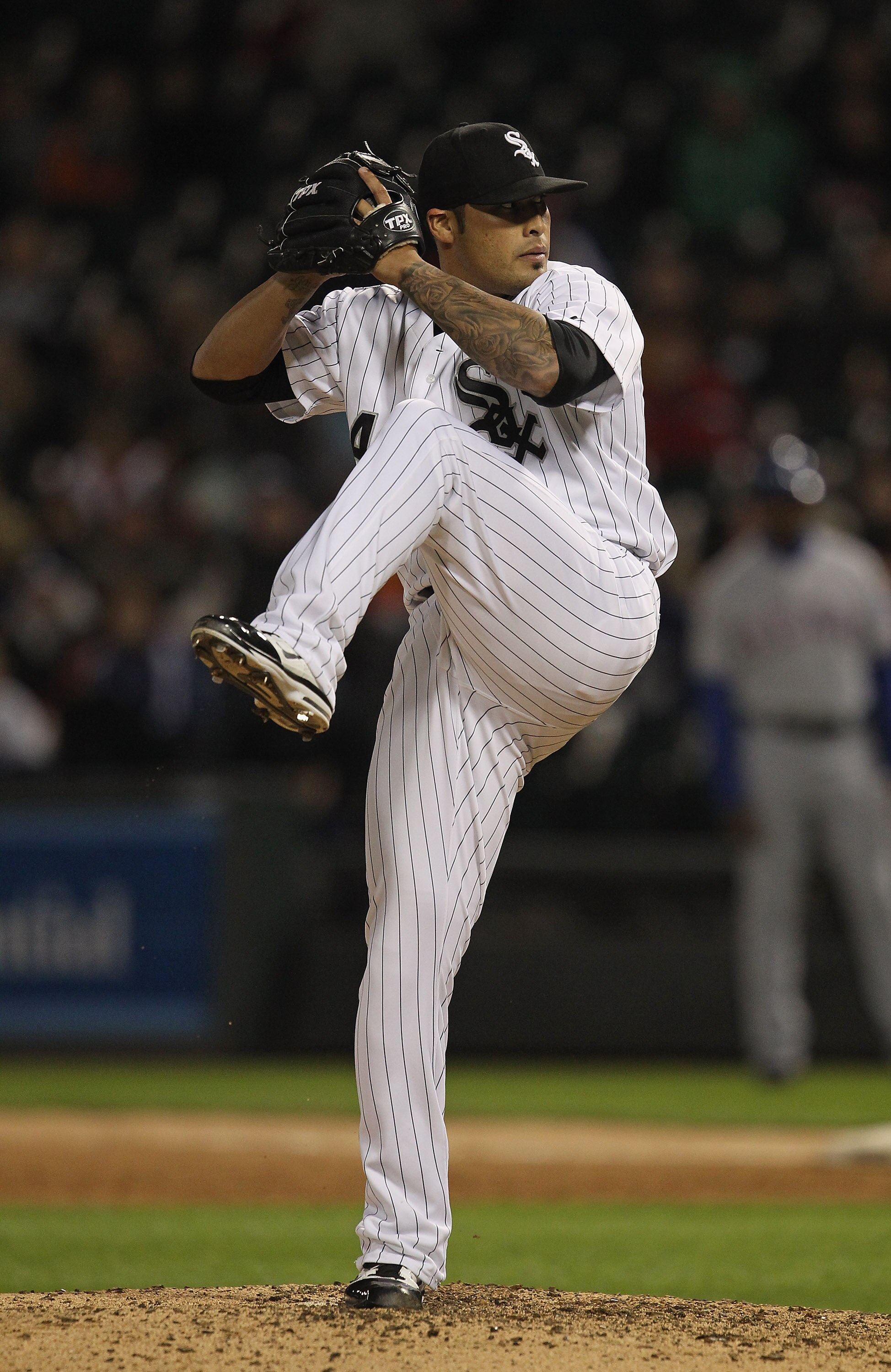 CHICAGO, IL - MAY 17: Sergio Santos #46 of the Chicago White Sox pitches against the Texas Rangers at U.S. Cellular Field on May 17, 2011 in Chicago, Illinois. The White Sox defeated the Rangers 4-3. (Photo by Jonathan Daniel/Getty Images)