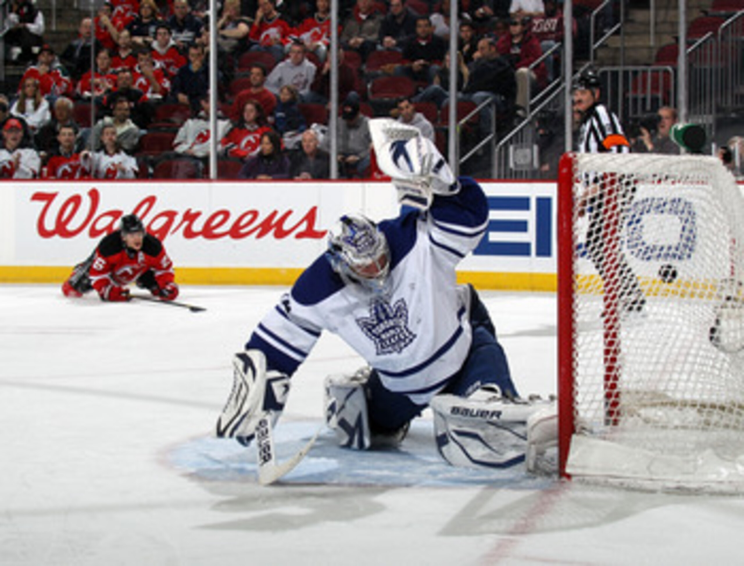 NEWARK, NJ - APRIL 06: A shot by Mattias Tedenby #21 of the New Jersey Devils (not shown) eludes James Reimer #34 of the Toronto Maple Leafs at 14:29 of the second period at the Prudential Center on April 6, 2011 in Newark, New Jersey. (Photo by Bruce Be NEWARK, NJ - APRIL 06: A shot by Mattias Tedenby #21 of the New Jersey Devils (not shown) eludes James Reimer #34 of the Toronto Maple Leafs at 14:29 of the second period at the Prudential Center on April 6, 2011 in Newark, New Jersey. (Photo by Bruce Be