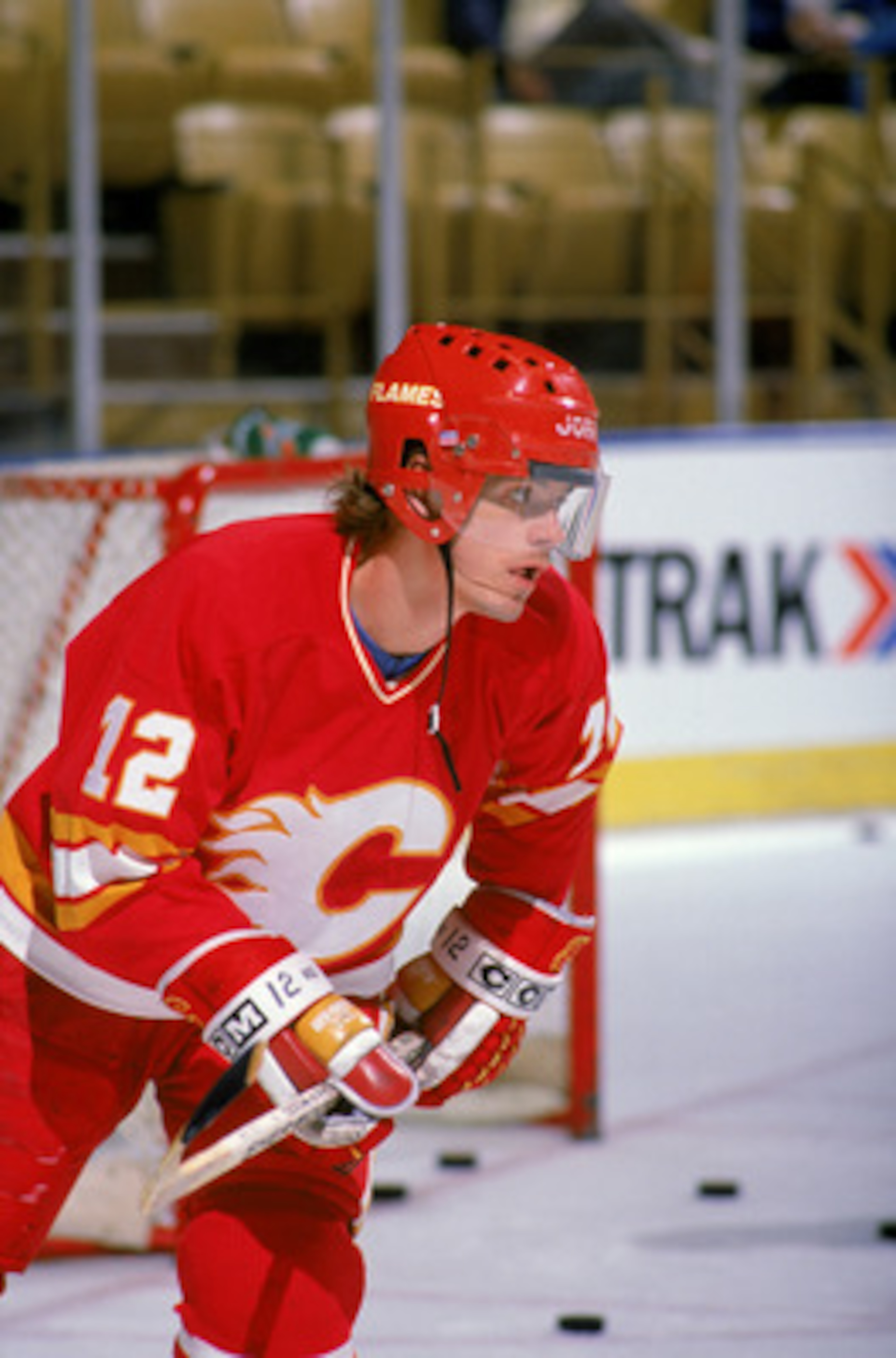 INGLEWOOD, CA - 1988: Hakan Loob #12 of the Calgary Flames skates during warm-ups prior to a game against the Los Angeles Kings in the 1988 NHL season at the Great Western Forum in Inglewood, California. (Photo by Tim DeFrisco/Getty Images) INGLEWOOD, CA - 1988: Hakan Loob #12 of the Calgary Flames skates during warm-ups prior to a game against the Los Angeles Kings in the 1988 NHL season at the Great Western Forum in Inglewood, California. (Photo by Tim DeFrisco/Getty Images)