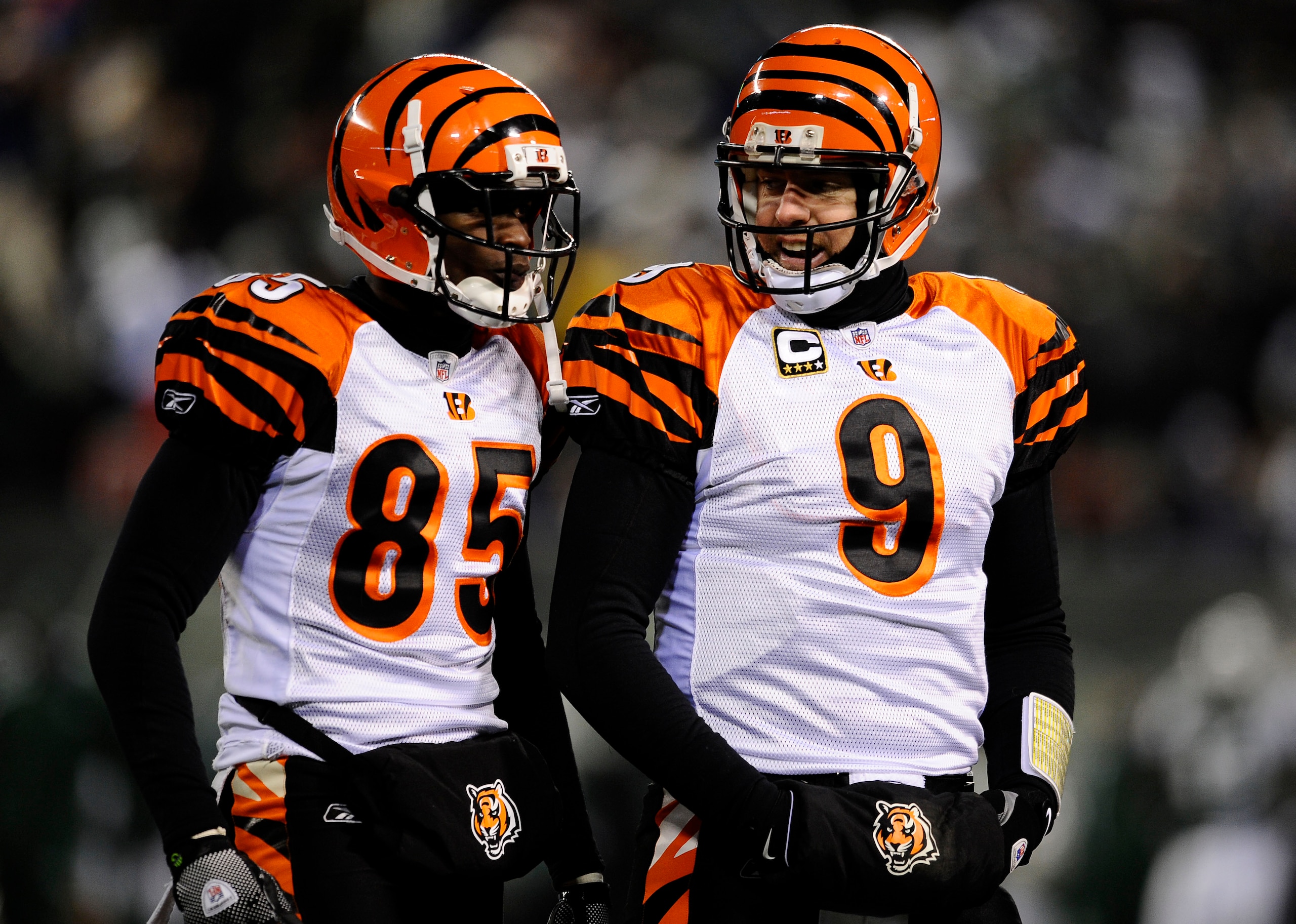 EAST RUTHERFORD, NJ - JANUARY 03: Quarterback Carson Palmer #9 of the Cincinnati Bengals talks with teammate Chad Ochocinco #85 during the game against the New York Jets at Giants Stadium on January 3, 2010 in East Rutherford, New Jersey. (Photo by Jeff EAST RUTHERFORD, NJ - JANUARY 03: Quarterback Carson Palmer #9 of the Cincinnati Bengals talks with teammate Chad Ochocinco #85 during the game against the New York Jets at Giants Stadium on January 3, 2010 in East Rutherford, New Jersey. (Photo by Jeff