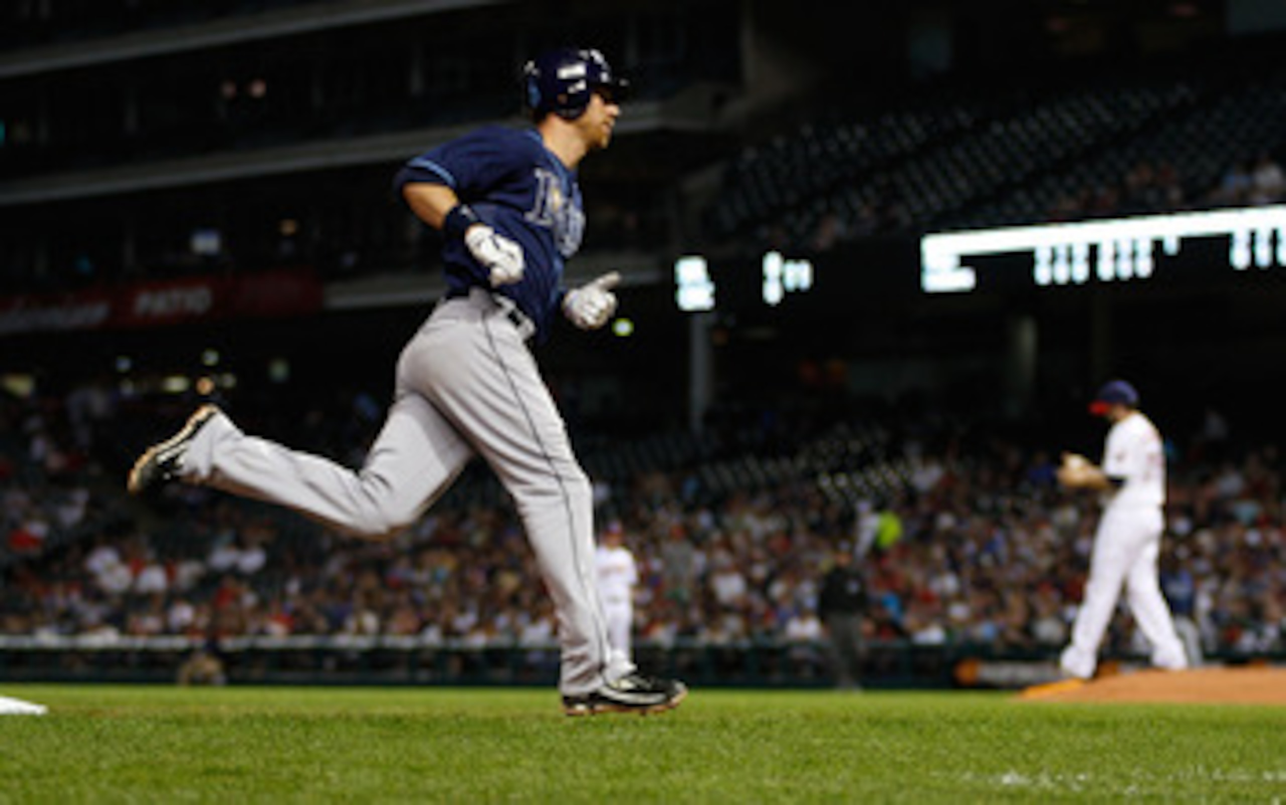 CLEVELAND - MAY 11: Ben Zobrist #18 of the Tampa Bay Rays trots around third base after hitting a home run off of Justin Germano #39 of the Cleveland Indians during the game on May 11, 2011 at Progressive Field in Cleveland, Ohio.  (Photo by Jared Wickerh