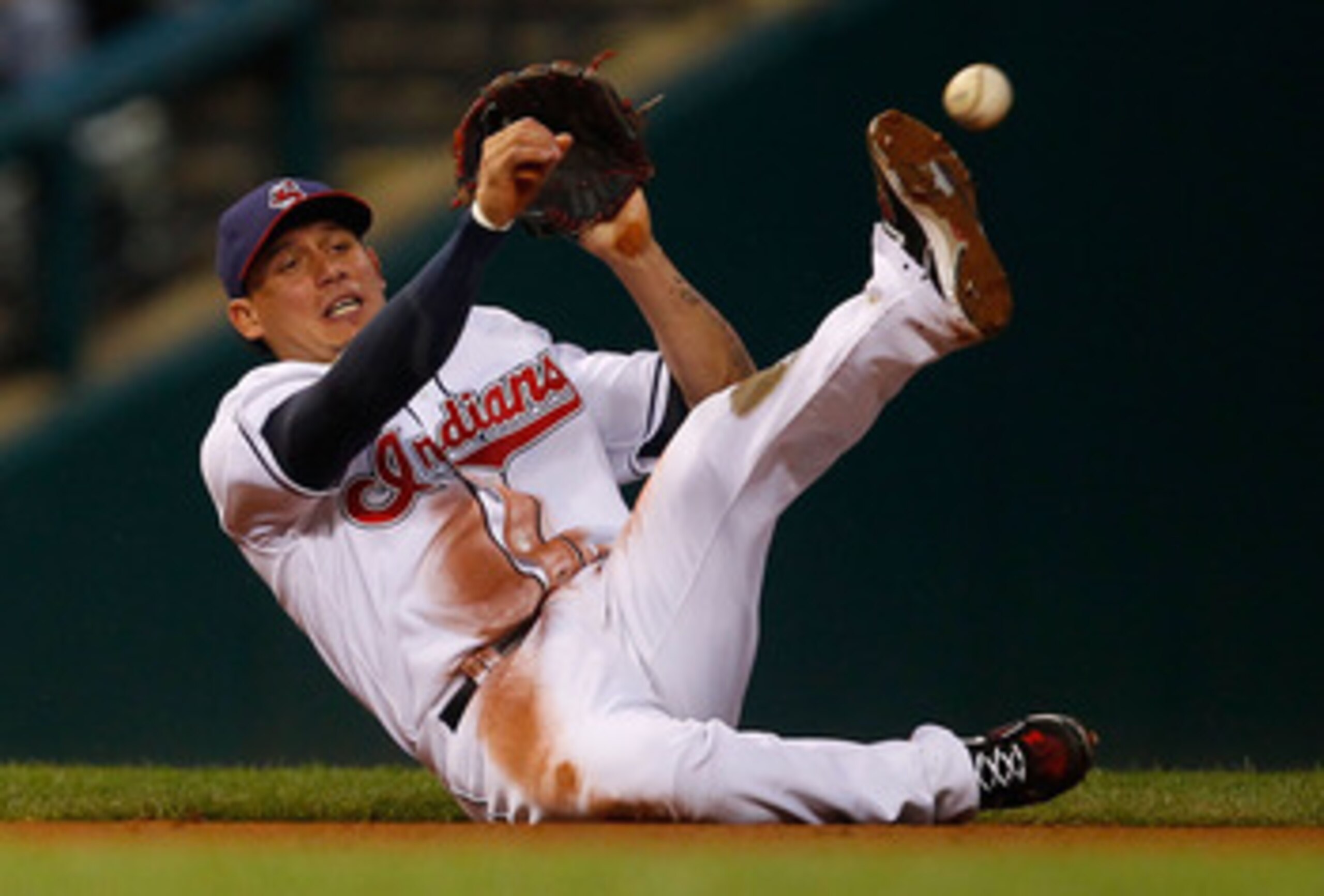 CLEVELAND - MAY 13:  Asdrubal Cabrera #13 of the Cleveland Indians fields a ground ball against the Seattle Mariners during the game on May 13, 2011 at Progressive Field in Cleveland, Ohio.  (Photo by Jared Wickerham/Getty Images)