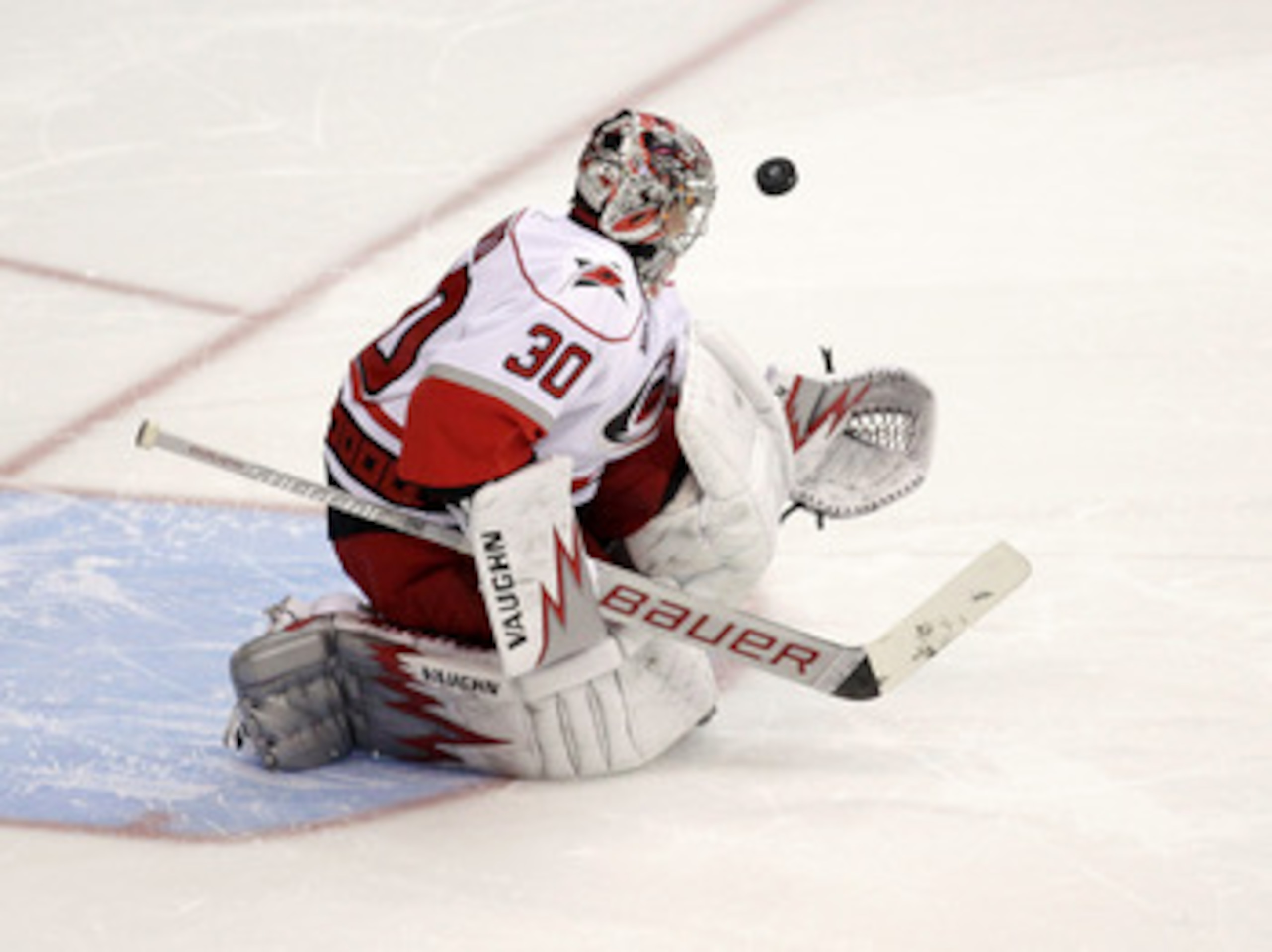 WASHINGTON, DC - MARCH 29: Goalie Cam Ward #30 of the Carolina Hurricanes blocks a shot on goal during a shootout against the Washington Capitals at the Verizon Center on March 29, 2011 in Washington, DC. (Photo by Rob Carr/Getty Images) WASHINGTON, DC - MARCH 29: Goalie Cam Ward #30 of the Carolina Hurricanes blocks a shot on goal during a shootout against the Washington Capitals at the Verizon Center on March 29, 2011 in Washington, DC. (Photo by Rob Carr/Getty Images)