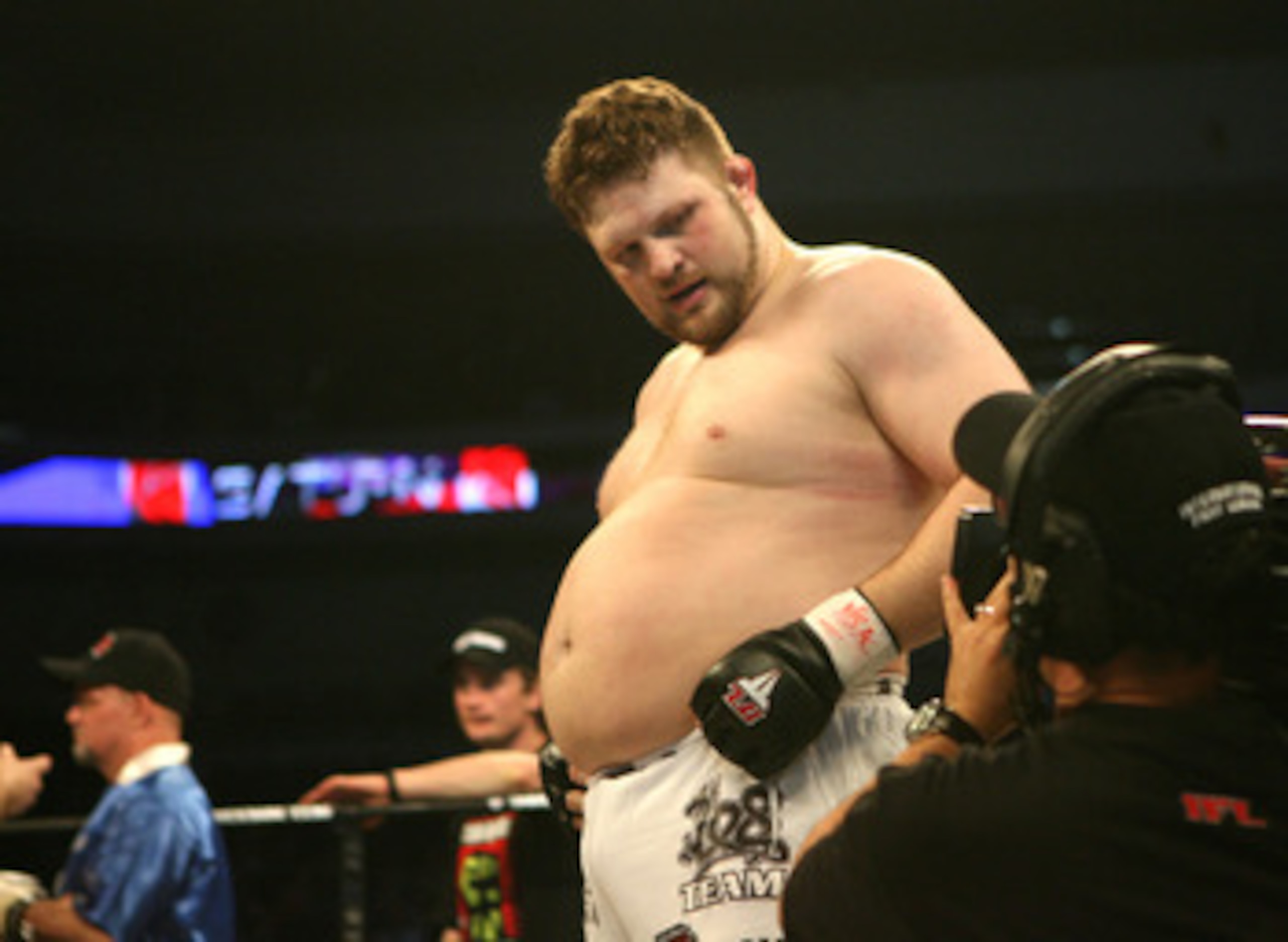LAS VEGAS - FEBRUARY 29:  Roy Nelson white trunks of Lion's Den celebrates his victory over Fabiano Scherner red trunks of Team Quest during their Heavyweight title bout at The Orleans Arena on February 29, 2008 in Las Vegas, Nevada.  (Photo by Ethan Mill