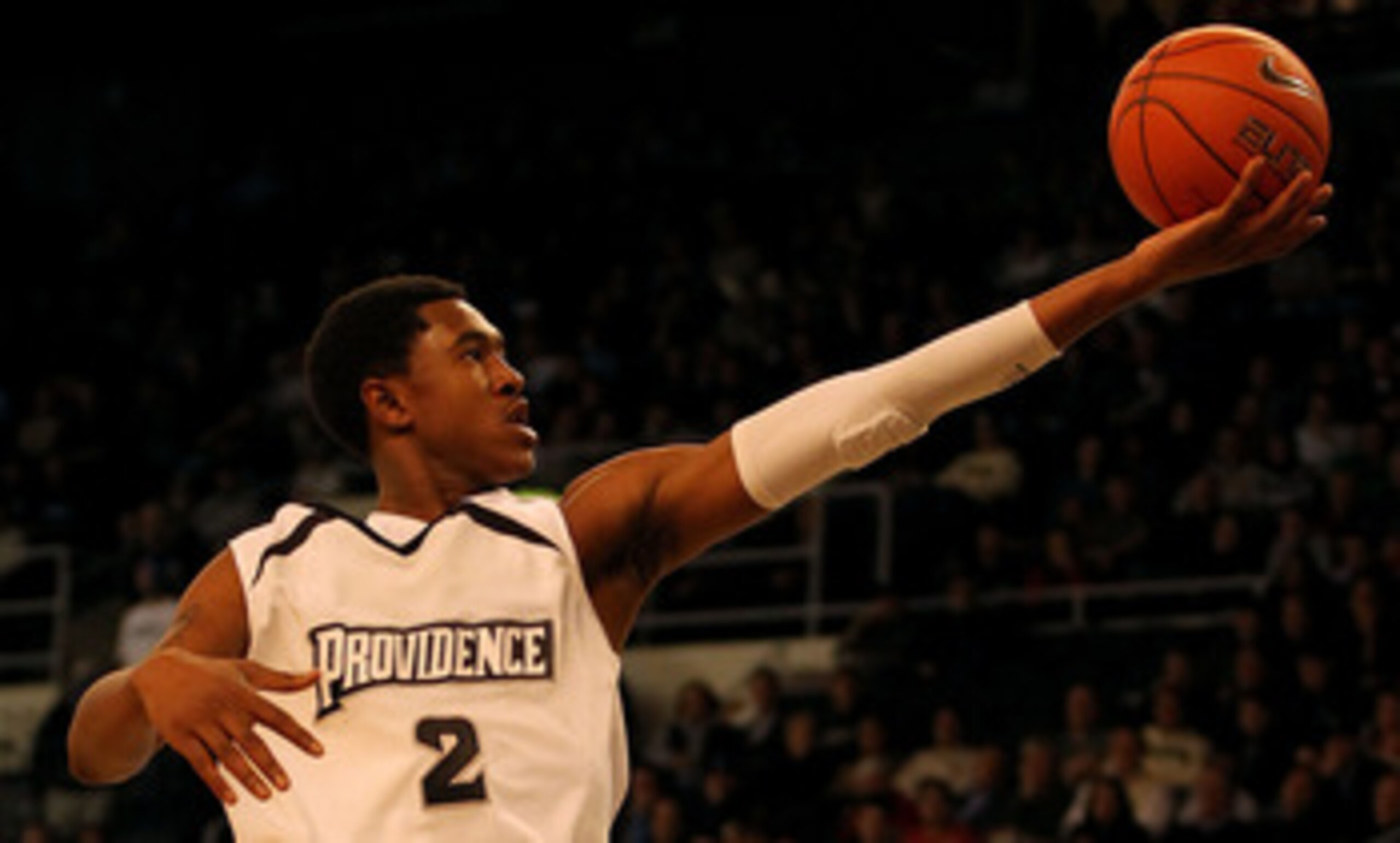 PROVIDENCE, RI - DECEMBER 04:  Marshon Brooks #2 of the Providence Friars drives for a shot attempt against the Rhode Island Rams at the Dunkin' Donuts Center on December 4, 2010 in Providence, Rhode Island.  (Photo by Chris Chambers/Getty Images)