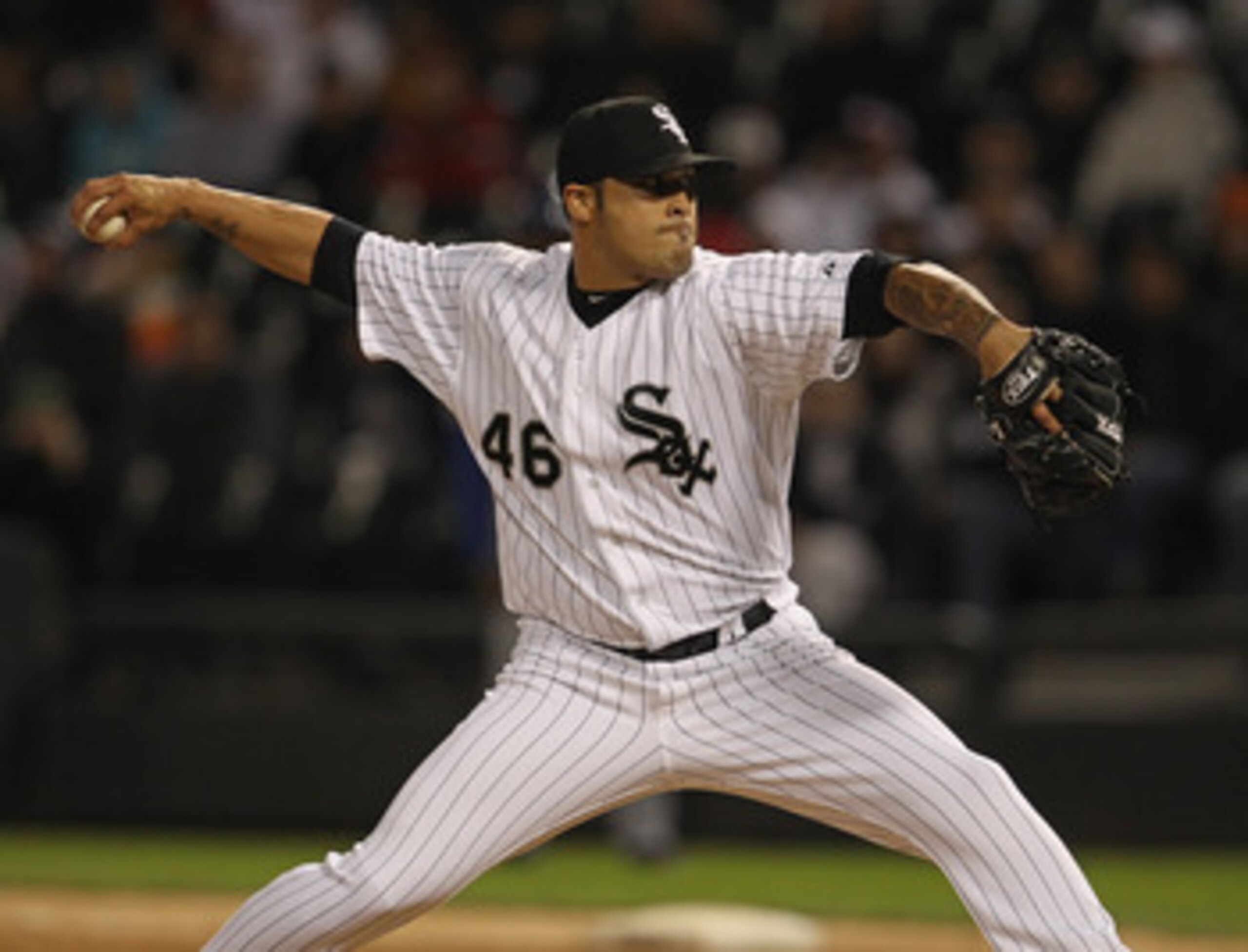 CHICAGO, IL - MAY 17: Sergio Santos #46 of the Chicago White Sox pitches against the Texas Rangers at U.S. Cellular Field on May 17, 2011 in Chicago, Illinois. The White Sox defeated the Rangers 4-3. (Photo by Jonathan Daniel/Getty Images) CHICAGO, IL - MAY 17: Sergio Santos #46 of the Chicago White Sox pitches against the Texas Rangers at U.S. Cellular Field on May 17, 2011 in Chicago, Illinois. The White Sox defeated the Rangers 4-3. (Photo by Jonathan Daniel/Getty Images)