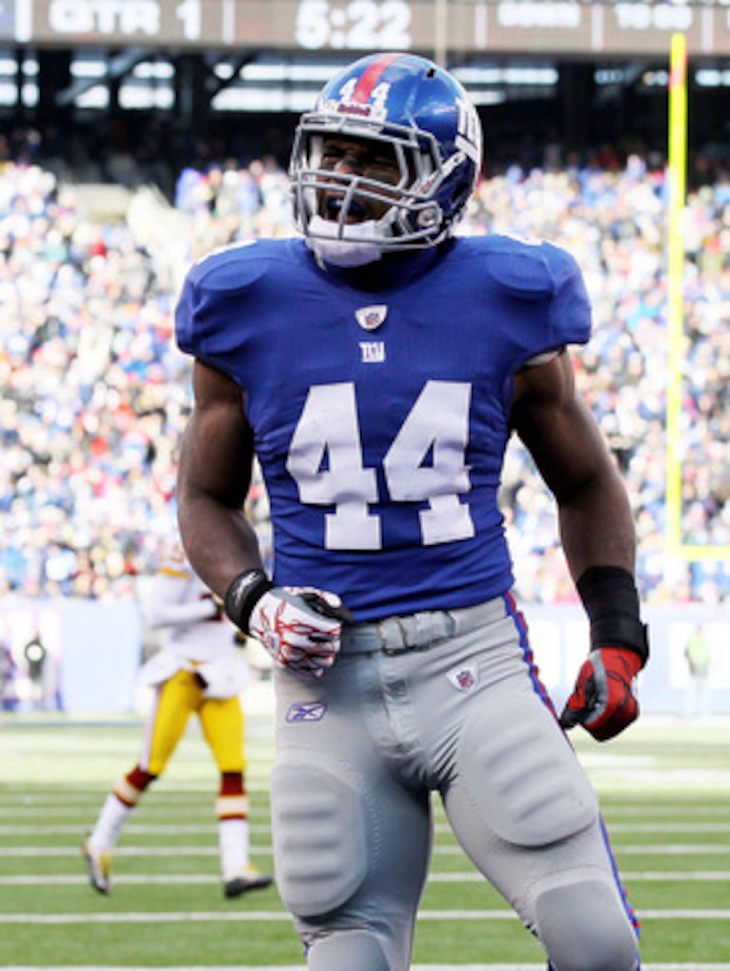 EAST RUTHERFORD, NJ - DECEMBER 05:  Ahmad Bradshaw #44 of the New York Giants celebrates his first quarter touchdown against the Washington Redskins on December 5, 2010 at the New Meadowlands Stadium in East Rutherford, New Jersey.  (Photo by Jim McIsaac/