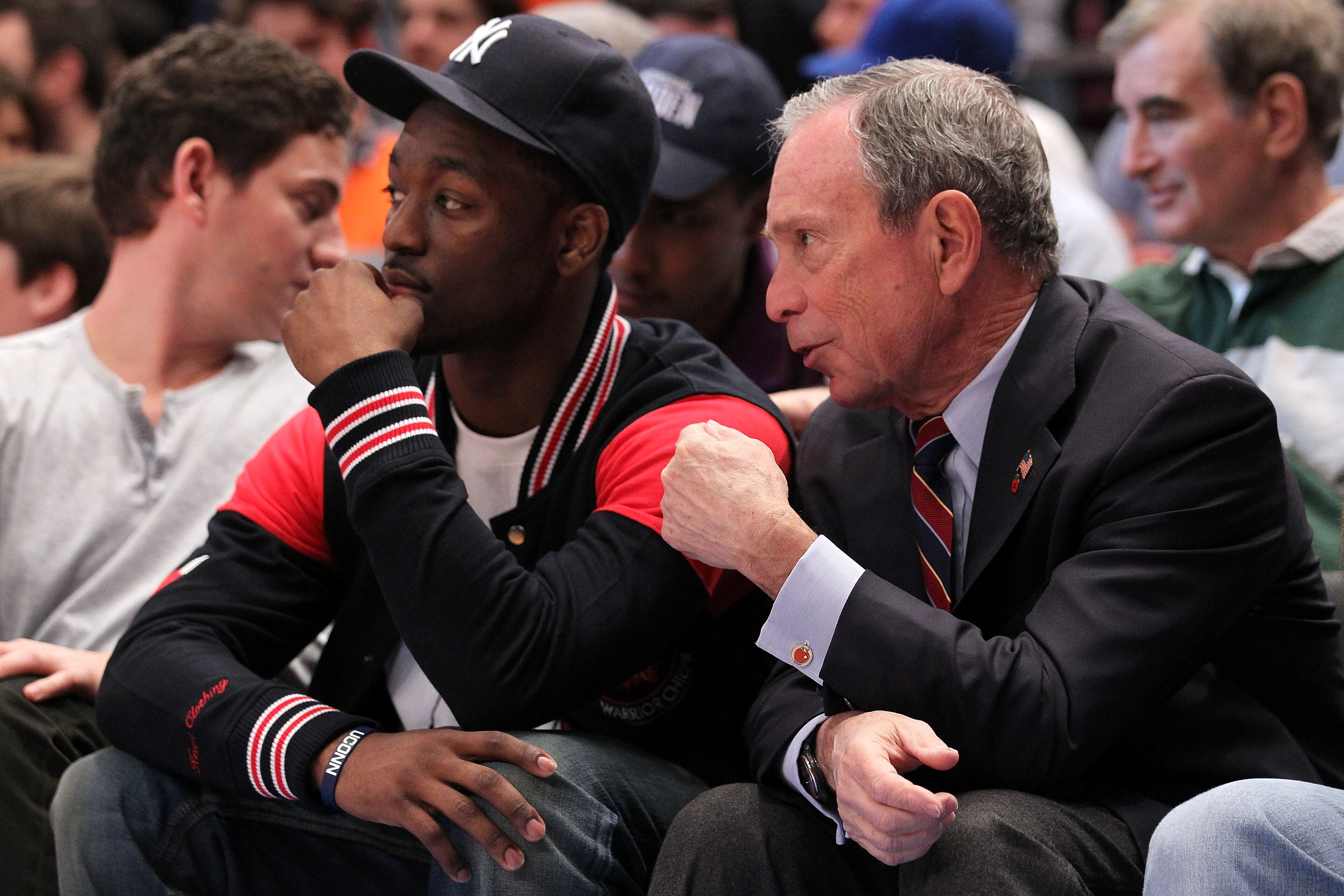 NEW YORK, NY - APRIL 24: NBA draft prospect Kemba Walker (L) from the University of Connecticut Huskies and New York City Mayor Michael Bloomberg watch the New York Knicks play against the Boston Celtics in Game Four of the Eastern Conference Quarterfina NEW YORK, NY - APRIL 24: NBA draft prospect Kemba Walker (L) from the University of Connecticut Huskies and New York City Mayor Michael Bloomberg watch the New York Knicks play against the Boston Celtics in Game Four of the Eastern Conference Quarterfina