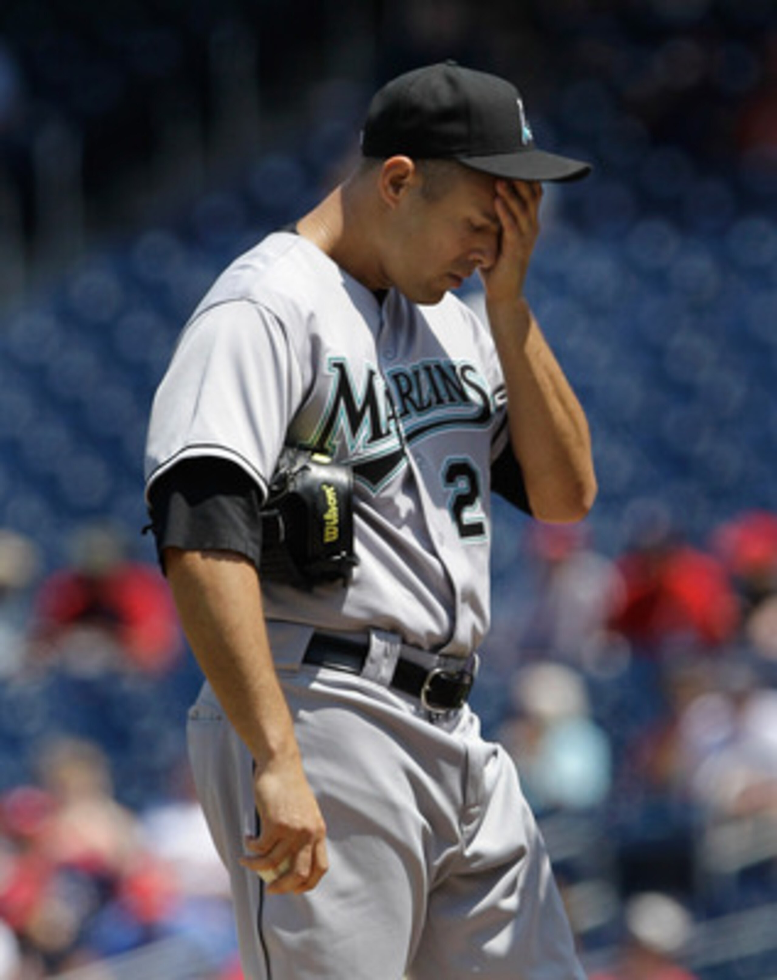 WASHINGTON, DC - MAY 15:  Starting pitcher Javier Vazquez #23 of the Florida Marlins reacts on the mound after giving up two runs to the Washington Nationals during the first inning at Nationals Park on May 15, 2011 in Washington, DC.  (Photo by Rob Carr/