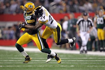 ARLINGTON, TX - FEBRUARY 06:  James Jones #89 of the Green Bay Packers runs for yards after the catch against Ike Taylor #24 of the Pittsburgh Steelers during Super Bowl XLV at Cowboys Stadium on February 6, 2011 in Arlington, Texas.  (Photo by Jamie Squi