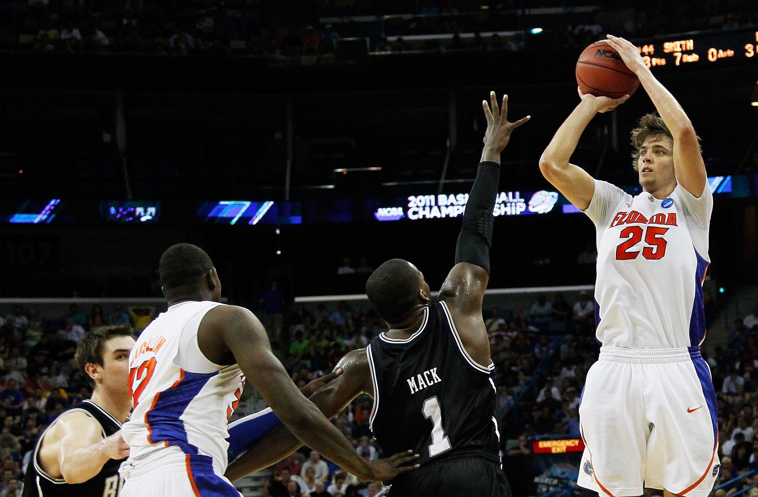 NEW ORLEANS, LA - MARCH 26:  Chandler Parsons #25 of the Florida Gators shoots over Shelvin Mack #1 of the Butler Bulldogs during the Southeast regional final of the 2011 NCAA men's basketball tournament at New Orleans Arena on March 26, 2011 in New Orlea