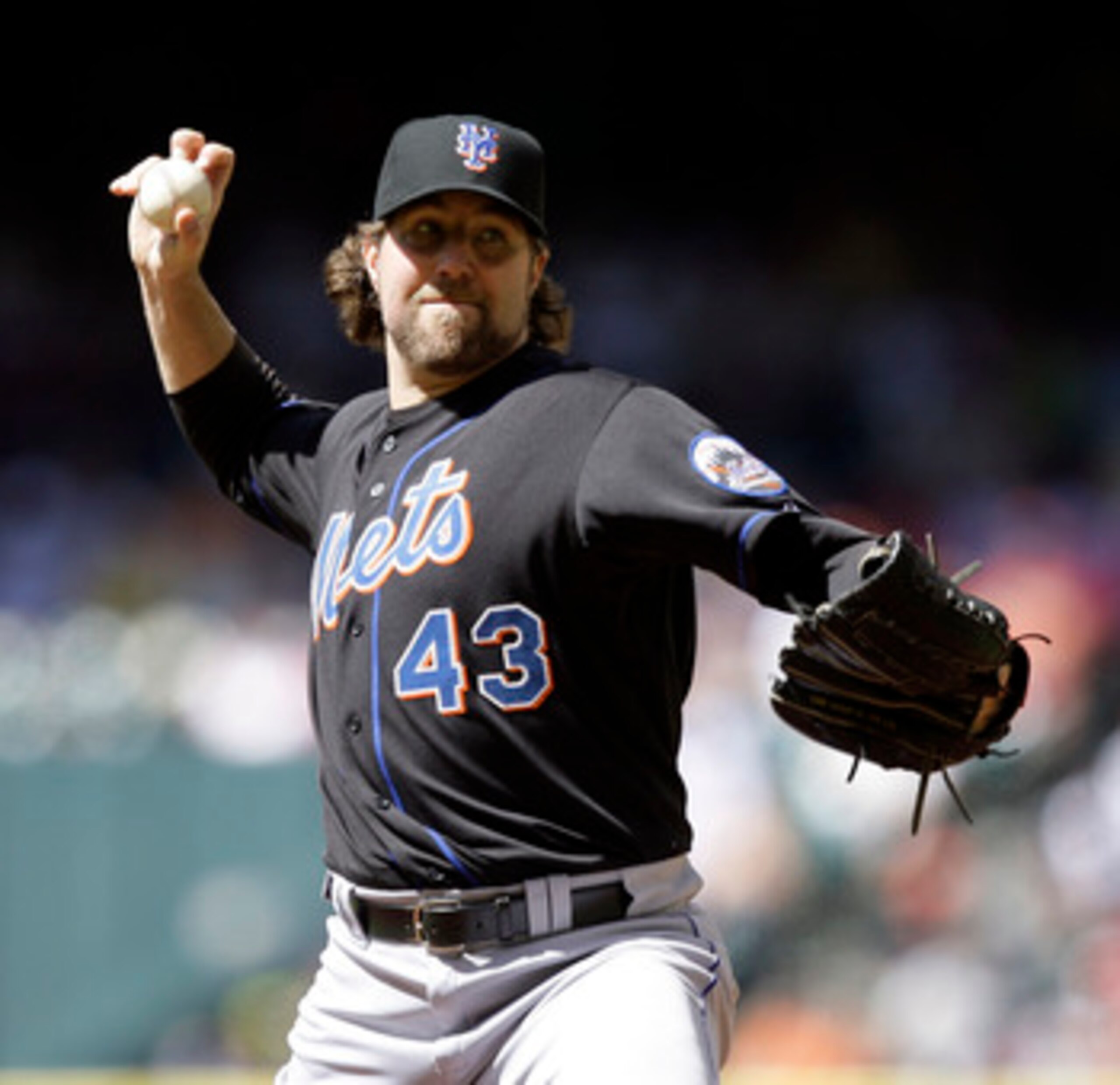 HOUSTON - MAY 14:  Pitcher R.A. Dickey #43  throws against the Houston Astros at Minute Maid Park on May 14, 2011 in Houston, Texas.  (Photo by Bob Levey/Getty Images)