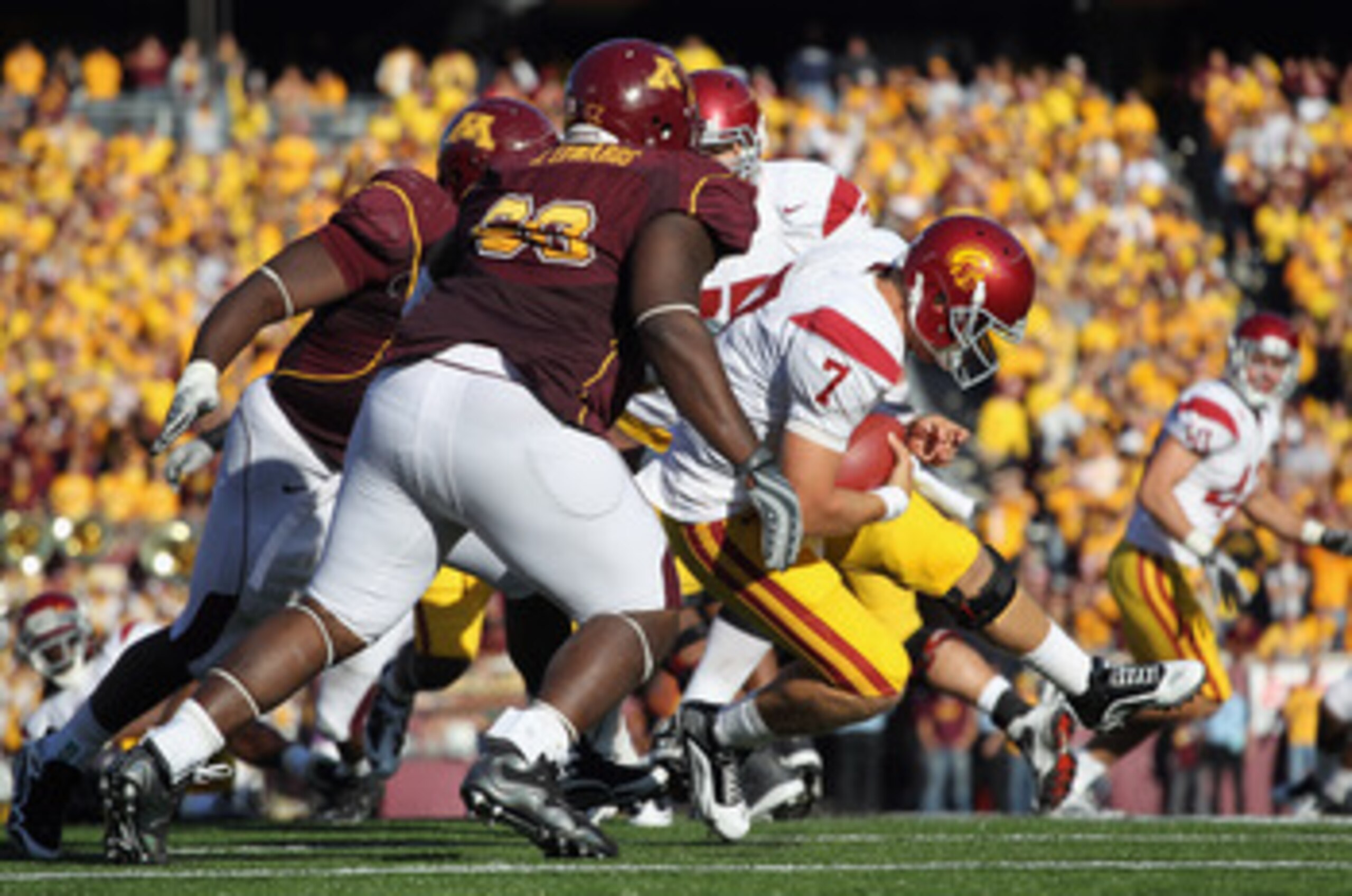 MINNEAPOLIS - SEPTEMBER 18: Quarterback Matt Barkley #7 of the USC Trojans is sacked during the game against the Minnesota Golden Gophers on September 18, 2010 at TCF Bank Stadium in Minneapolis, Minnesota. (Photo by Jamie Squire/Getty Images) MINNEAPOLIS - SEPTEMBER 18: Quarterback Matt Barkley #7 of the USC Trojans is sacked during the game against the Minnesota Golden Gophers on September 18, 2010 at TCF Bank Stadium in Minneapolis, Minnesota. (Photo by Jamie Squire/Getty Images)